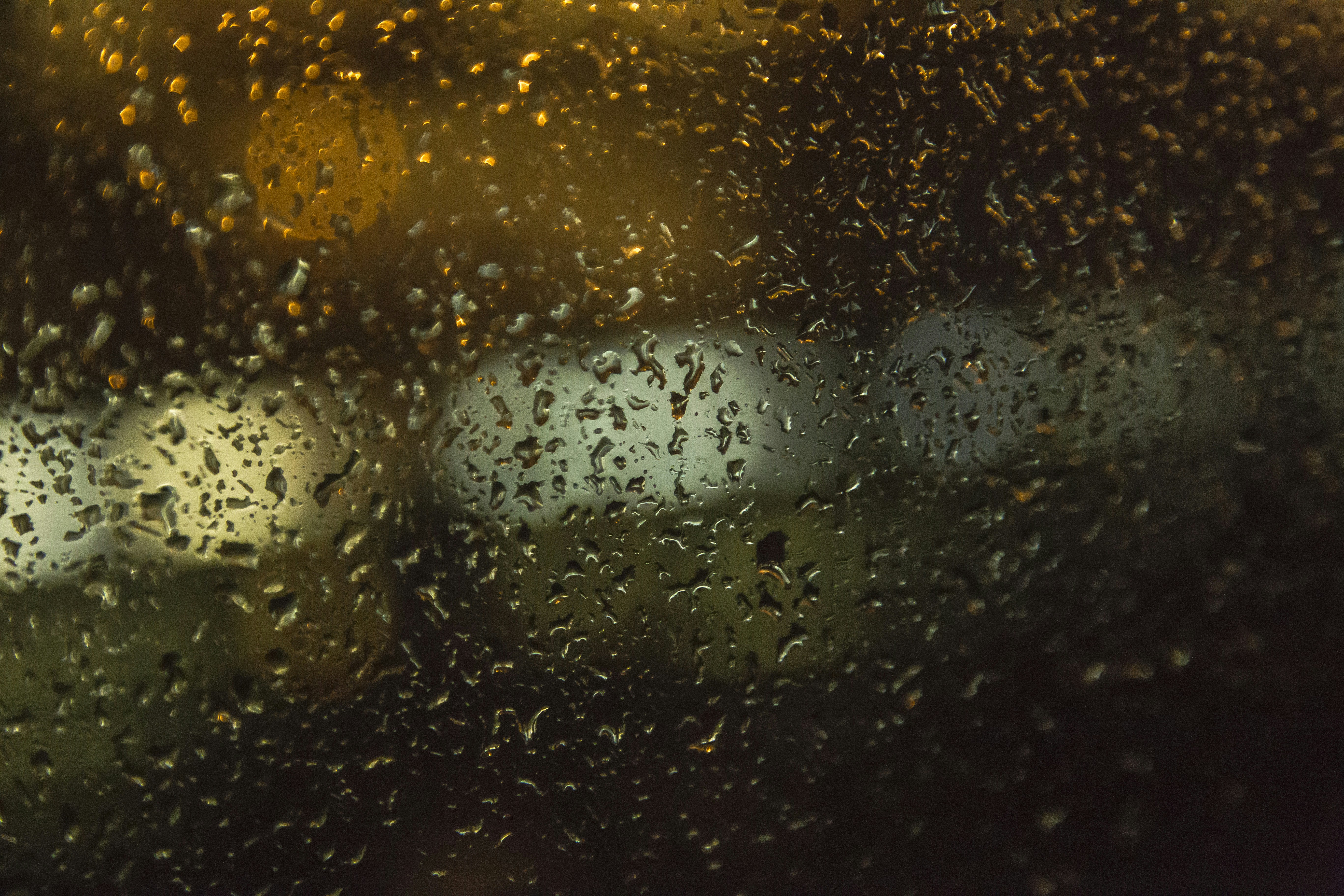 Raindrops on Glass at Night