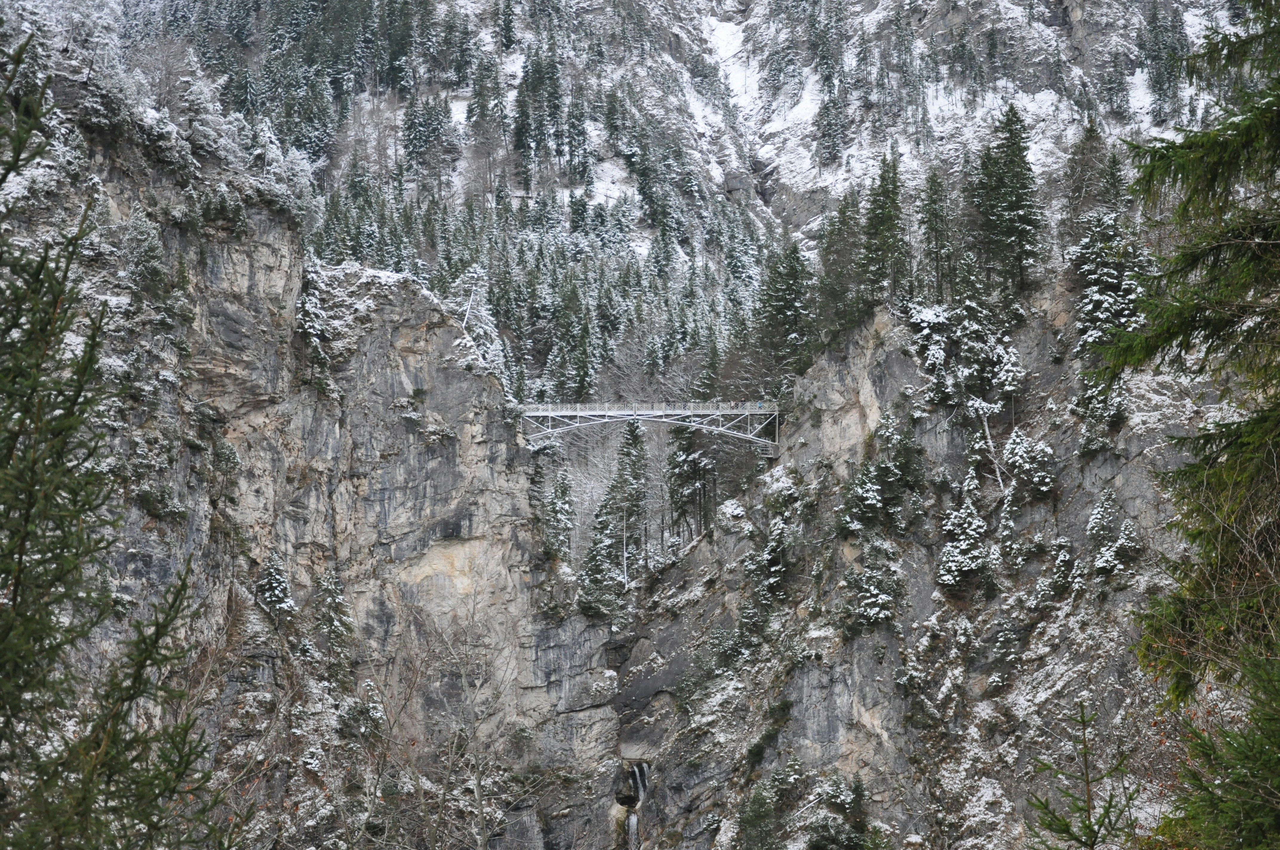 Snow-covered Mountain Gorge Bridge