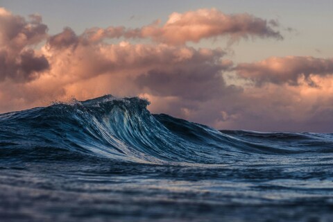 Breaking Ocean Wave at Sunset