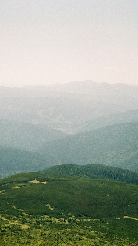 Layered Hazy Mountain Landscape