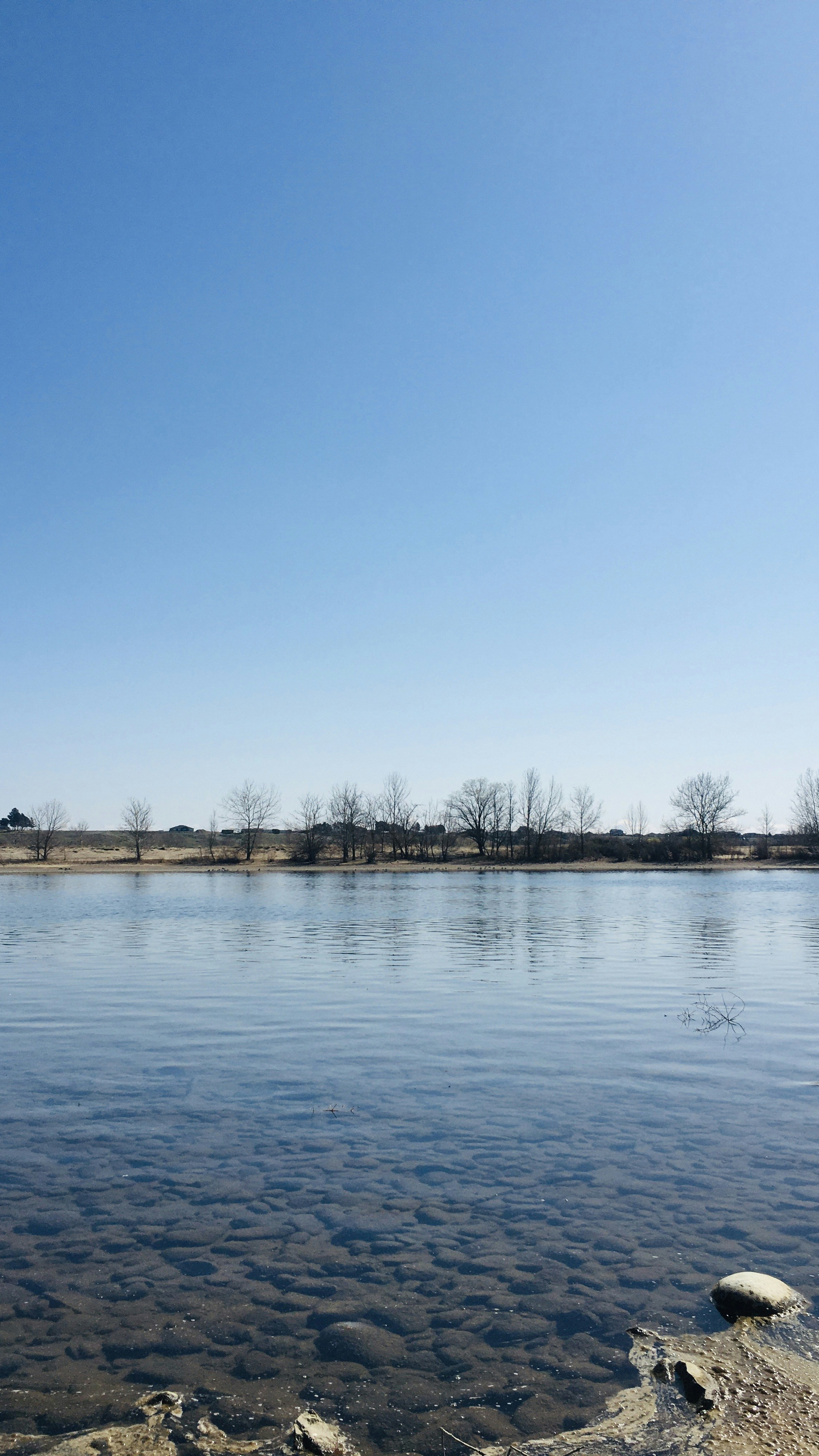 Calm Clear Lake on Sunny Day