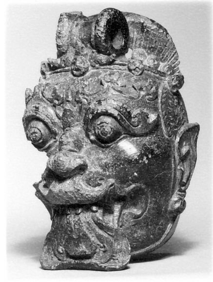 Ancient Carved Bronze Beast Head
