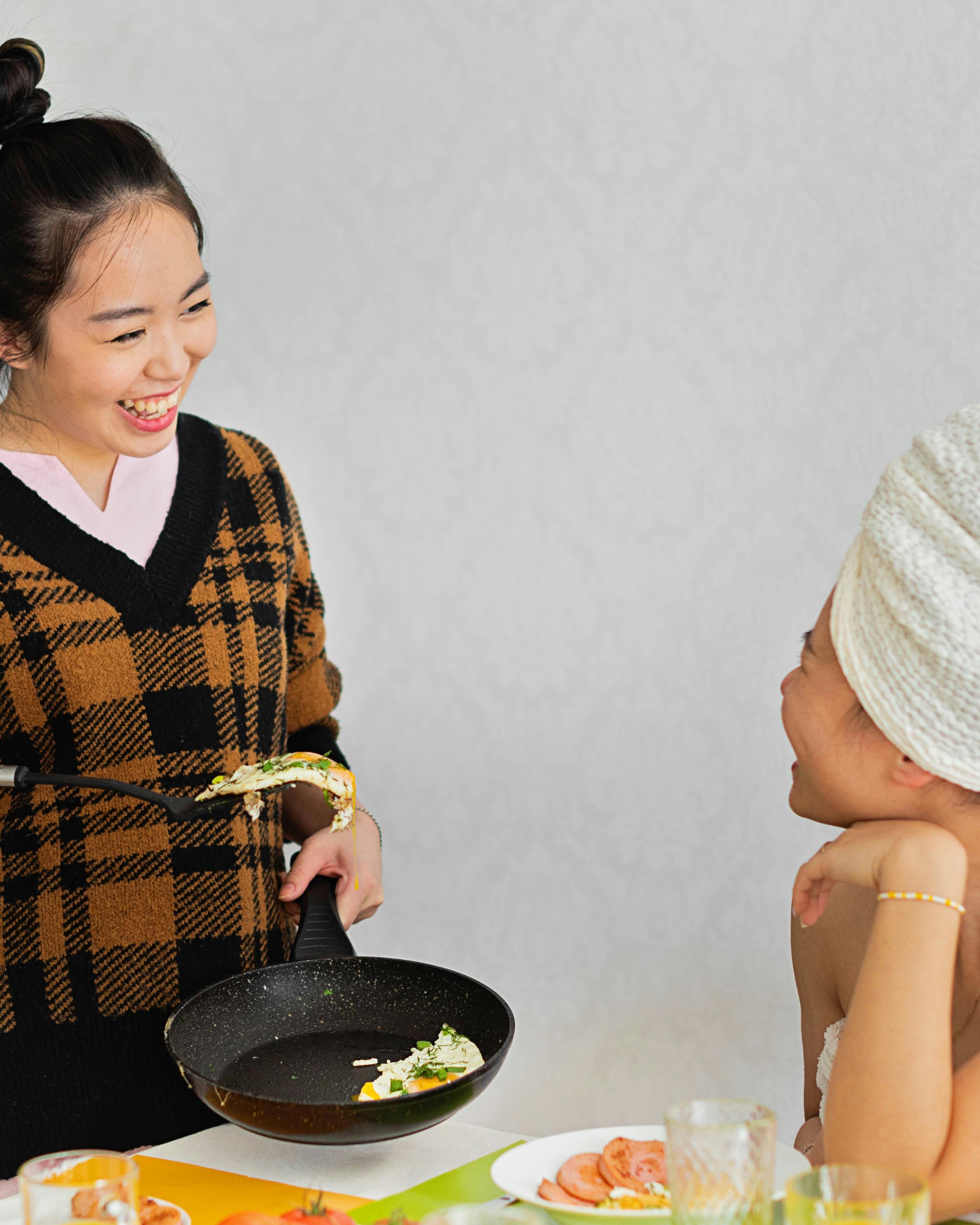 Two Friends Sharing Homemade Breakfast