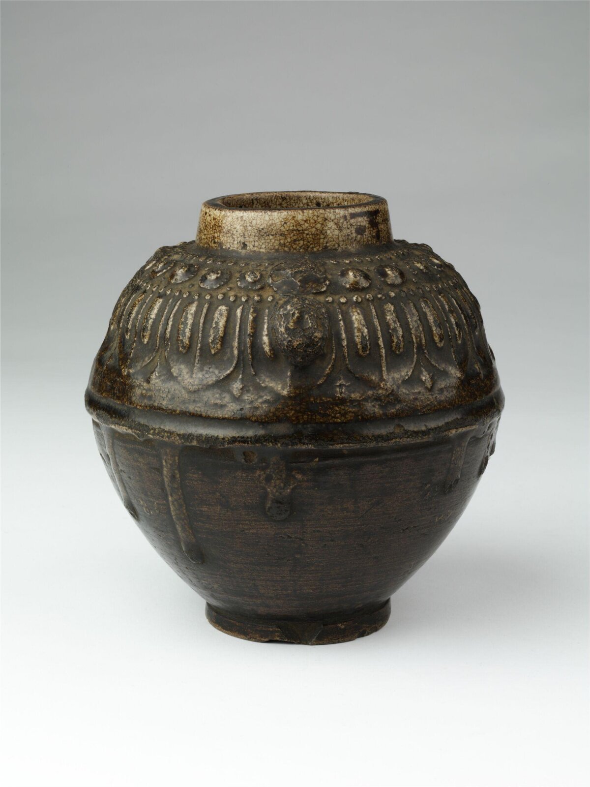 Ancient Brown Glazed Carved Pottery Jar