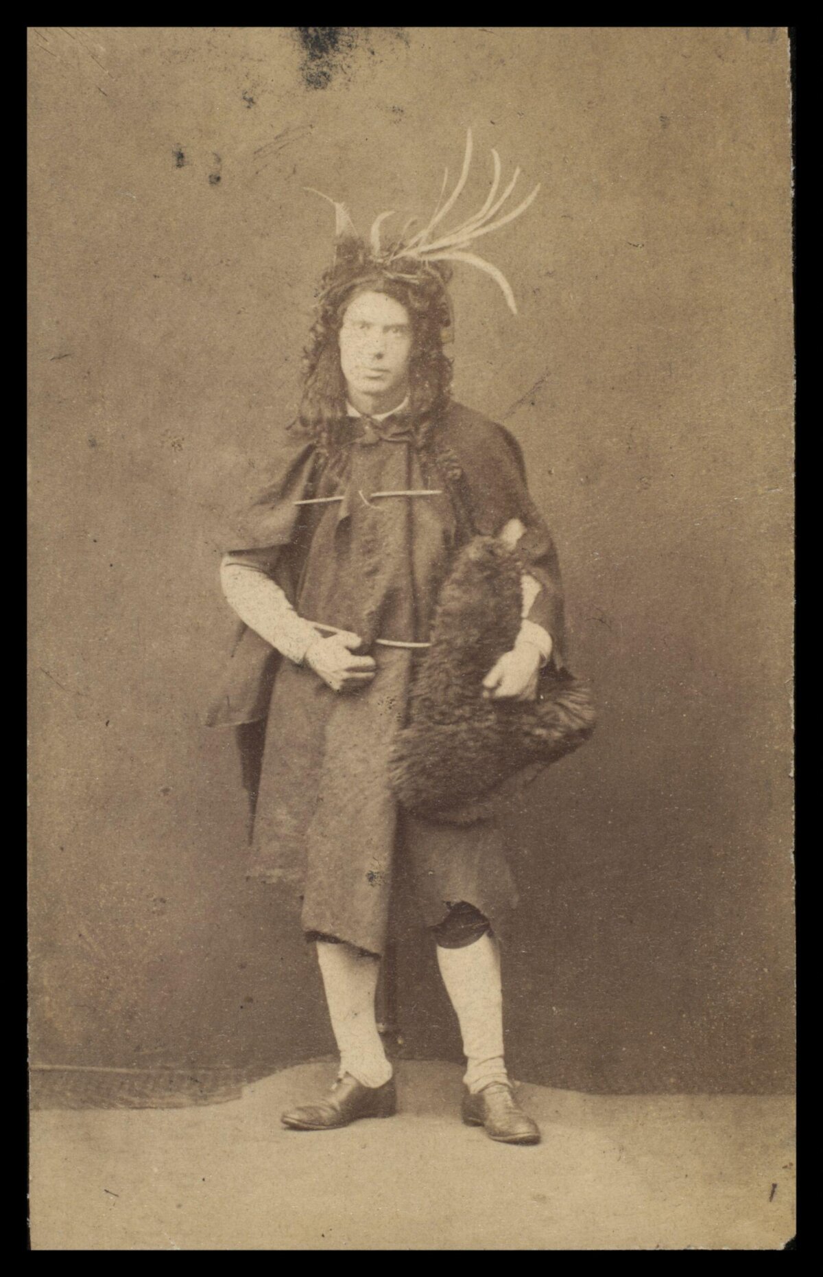 Vintage Portrait of Man in Antler Headdress
