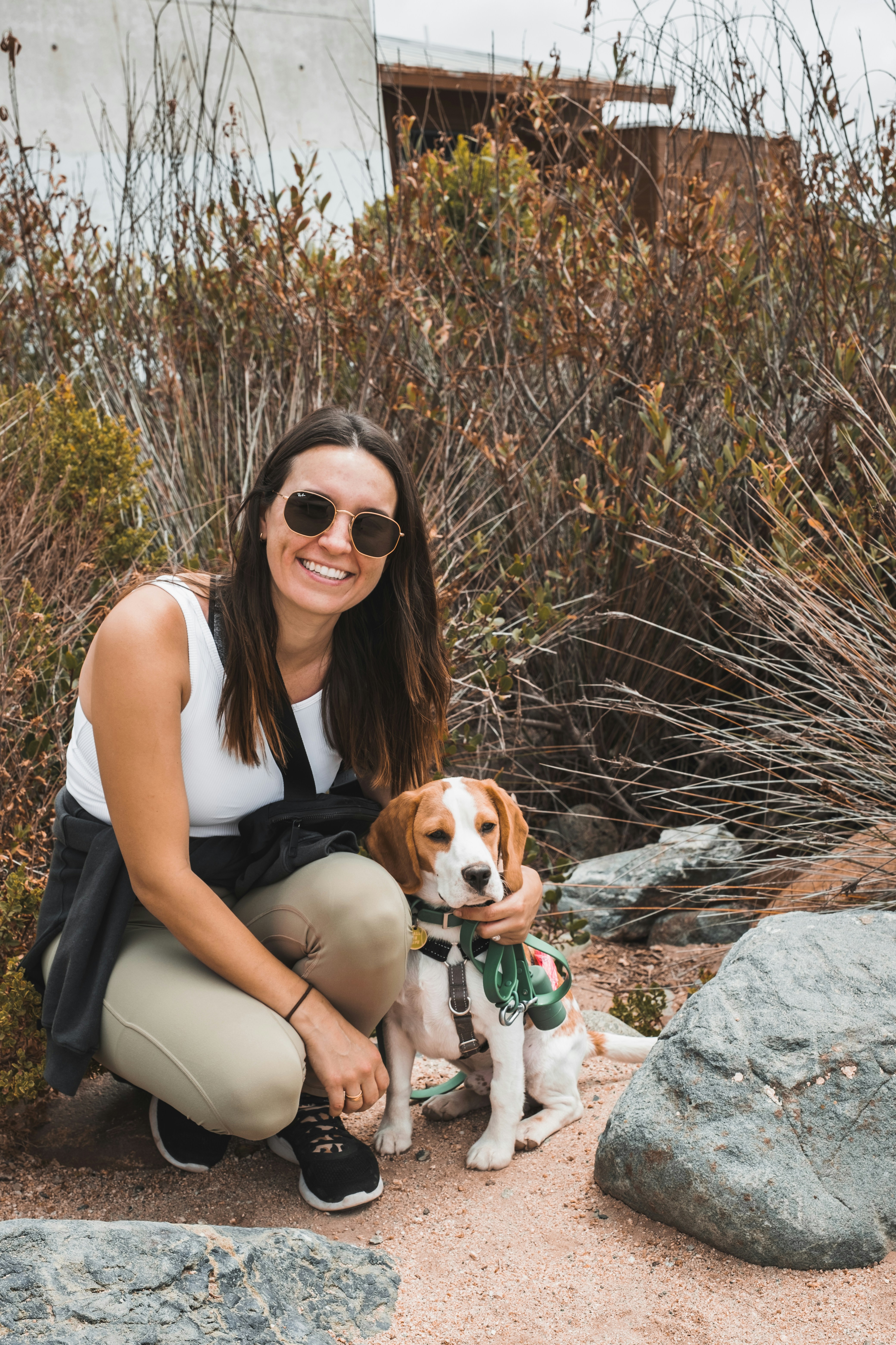 Woman Posing With Beagle On Hike