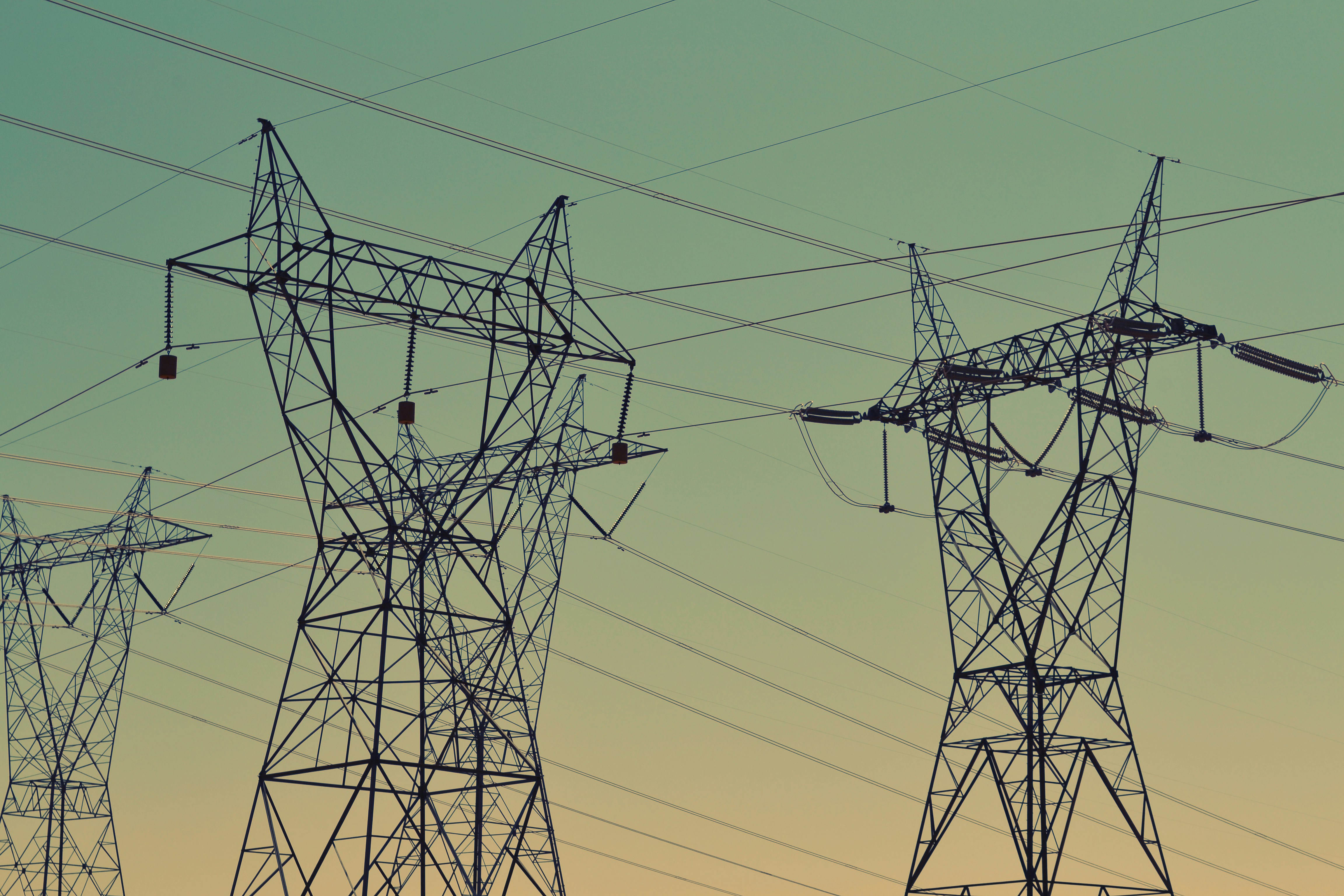 High Voltage Transmission Towers at Dusk