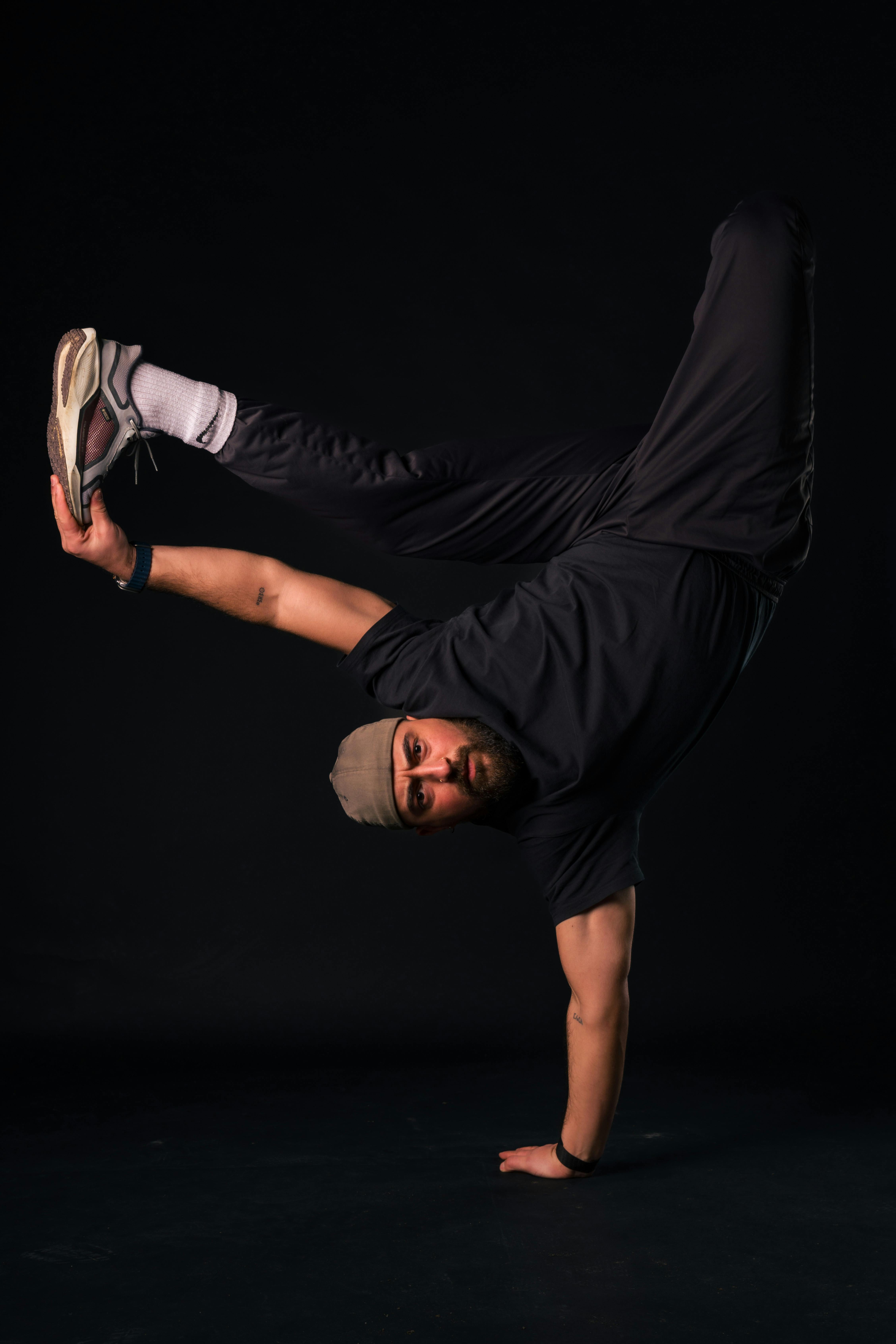 Breakdancer One-Hand Balance Pose