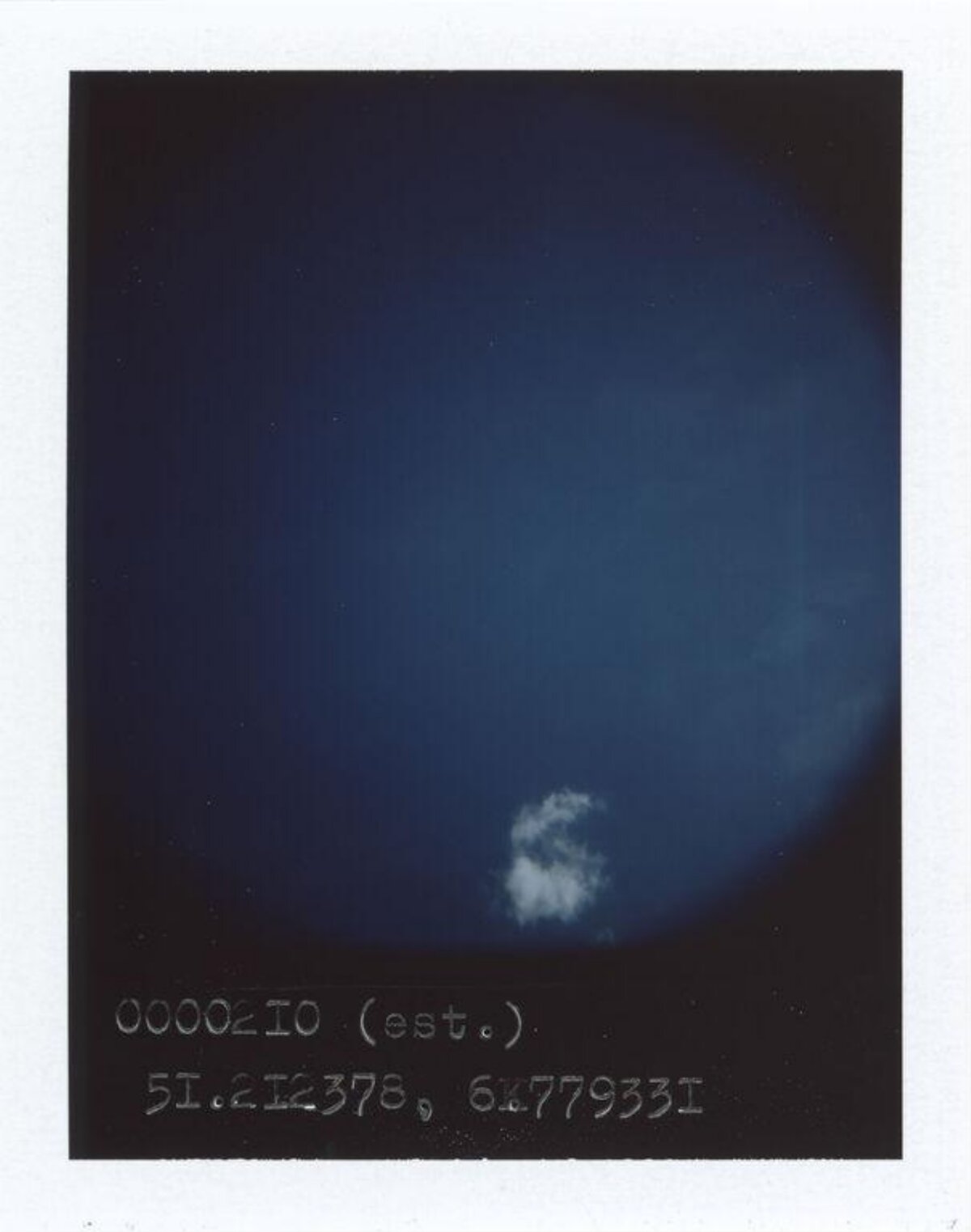 Single Small Cloud in Deep Blue Sky