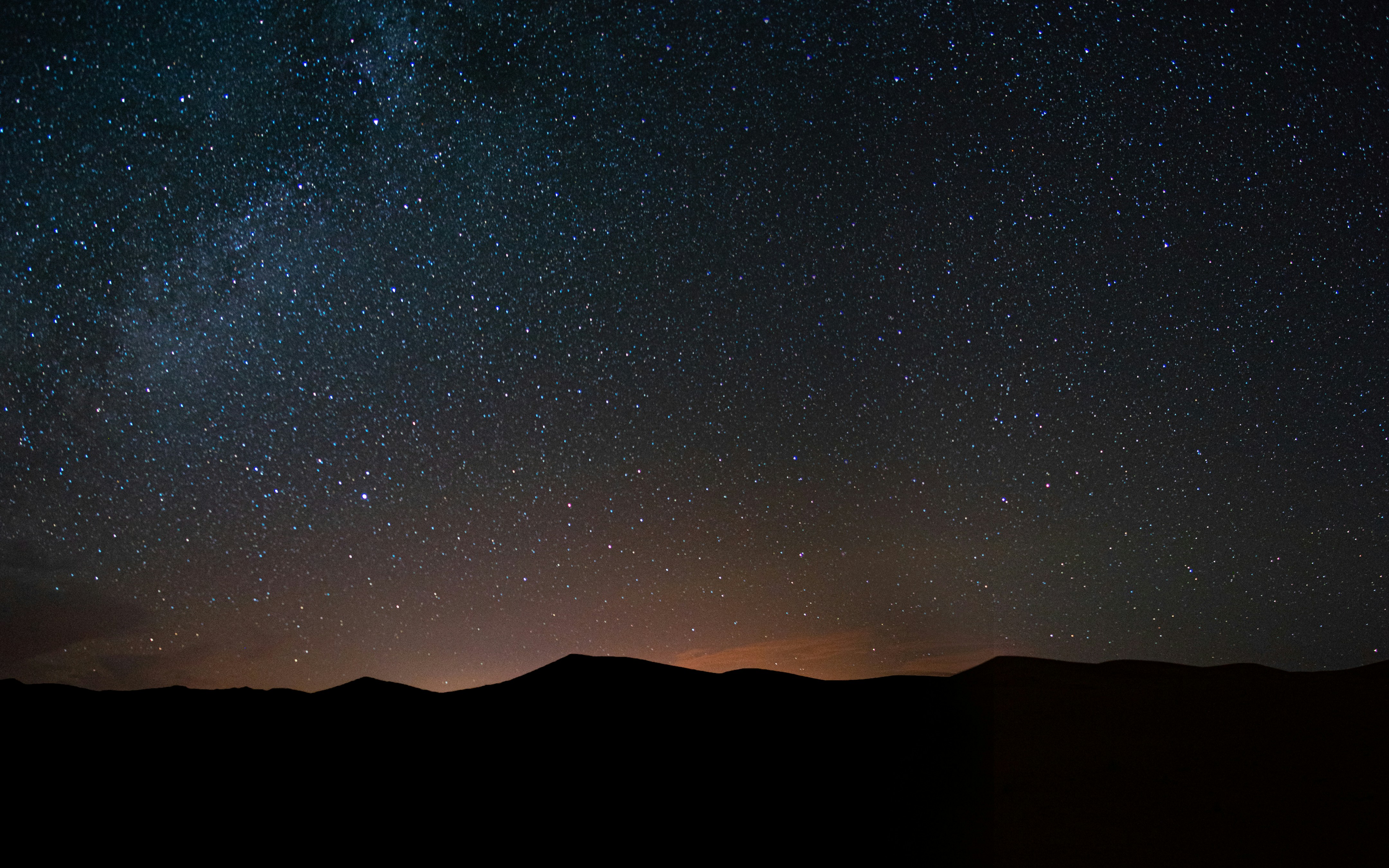Starry Night Sky Over Mountains