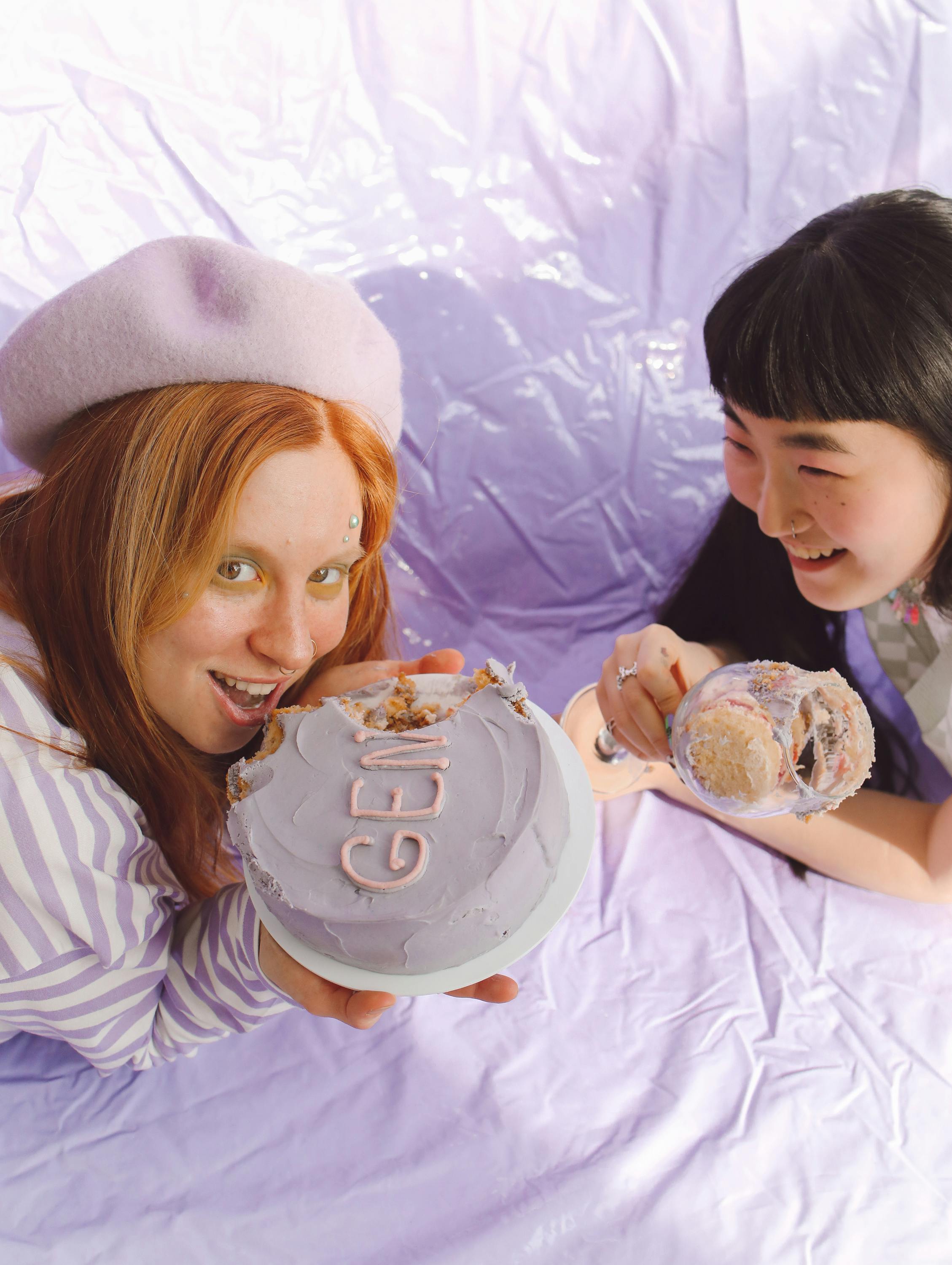 Two Happy Girls With Partially Eaten Cake