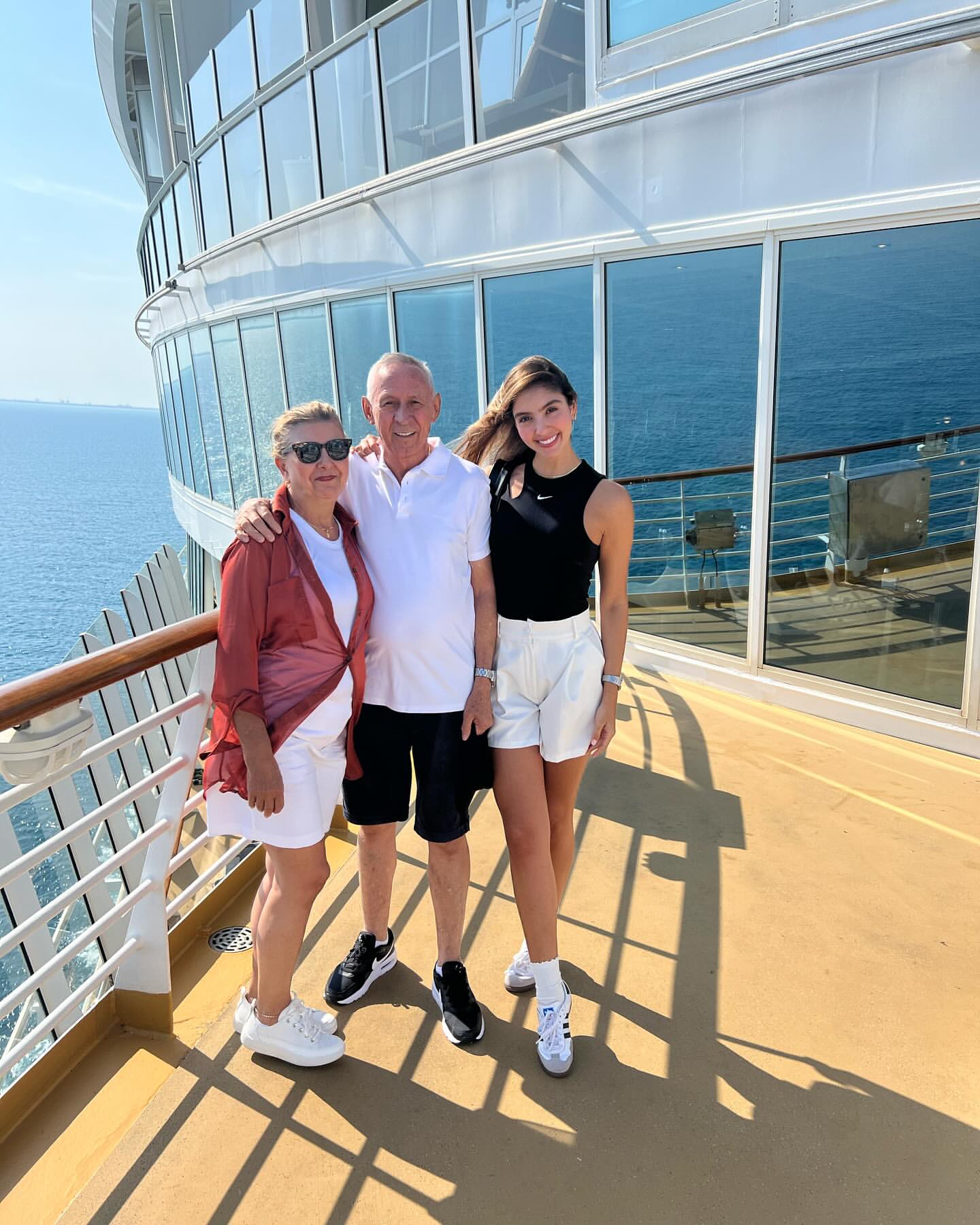Three People Posing on Cruise Ship Deck