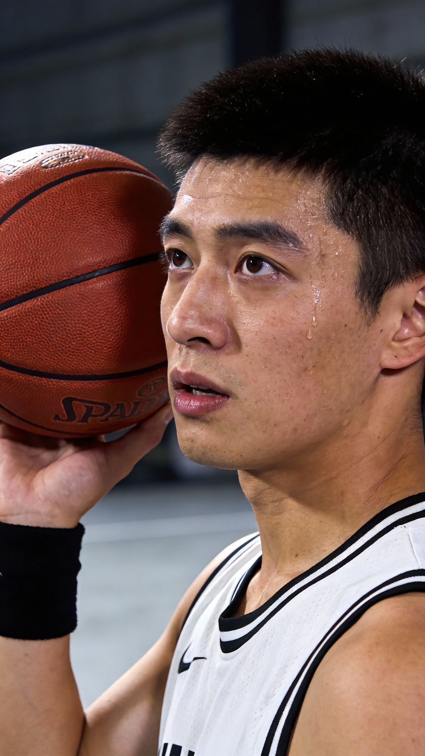 Male Basketball Player Holding Basketball