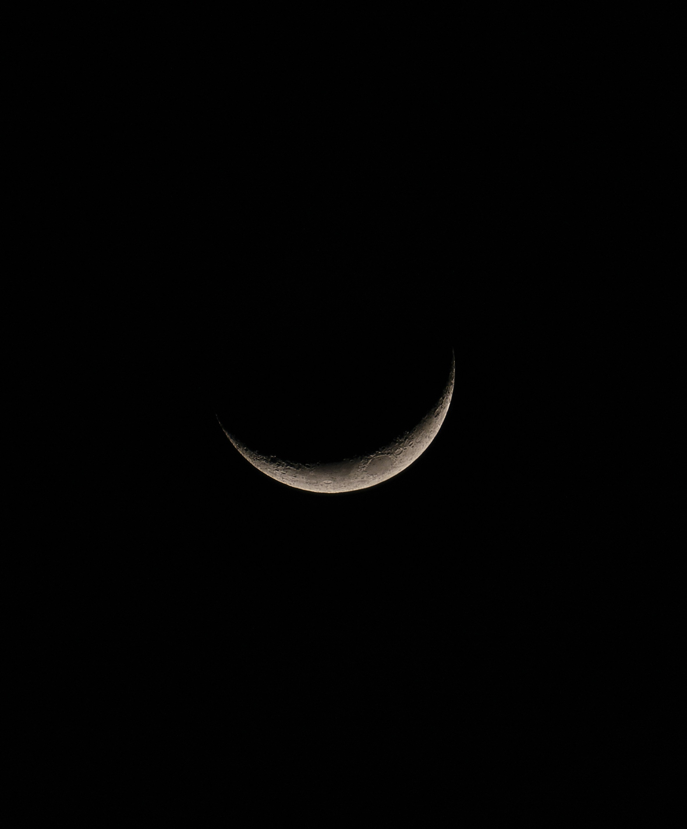 Crescent Moon in Dark Sky