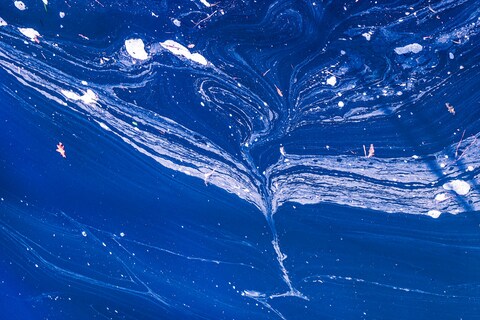 Swirling Deep Blue Water Surface