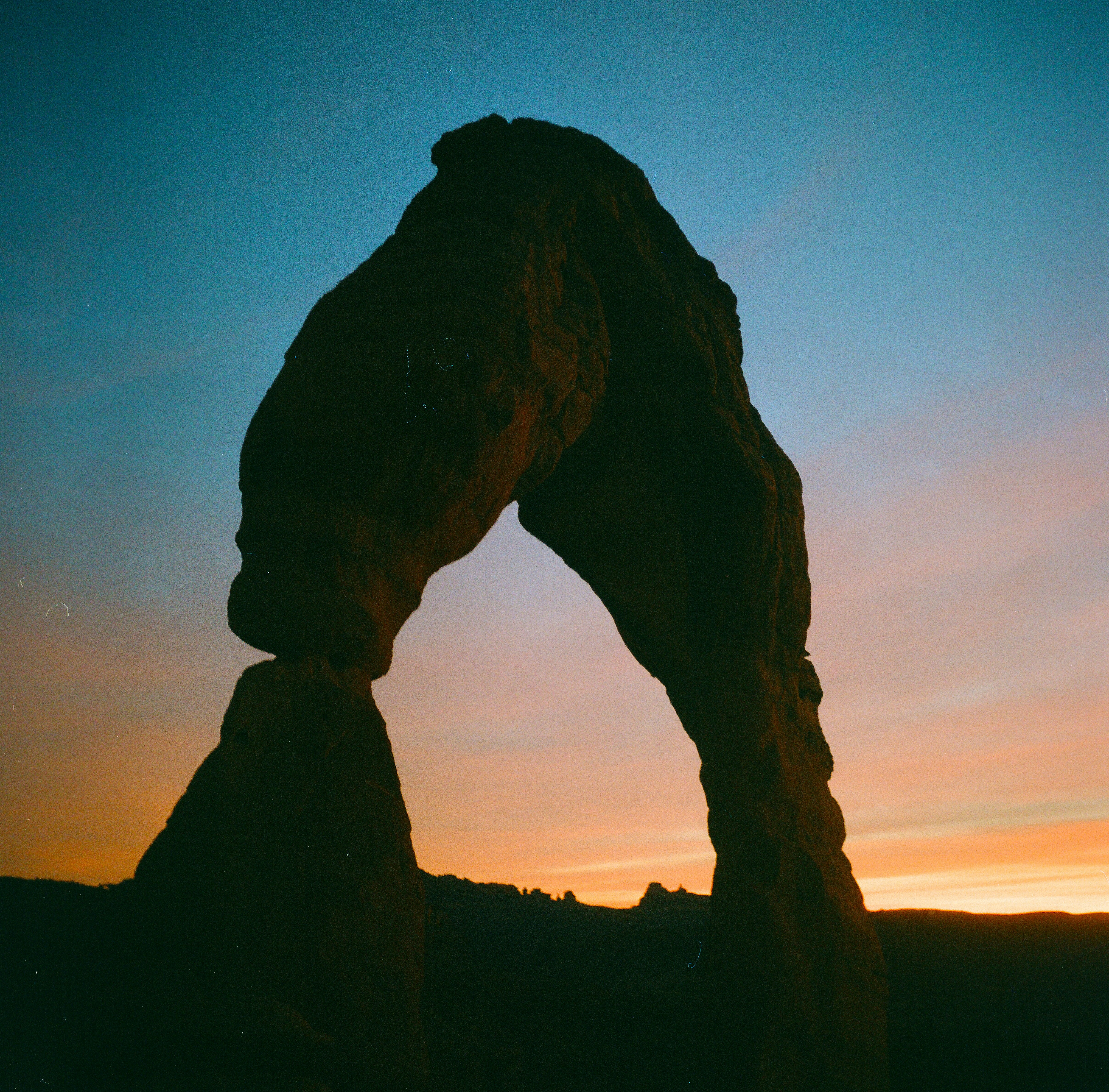 Natural Arch Silhouette at Sunset