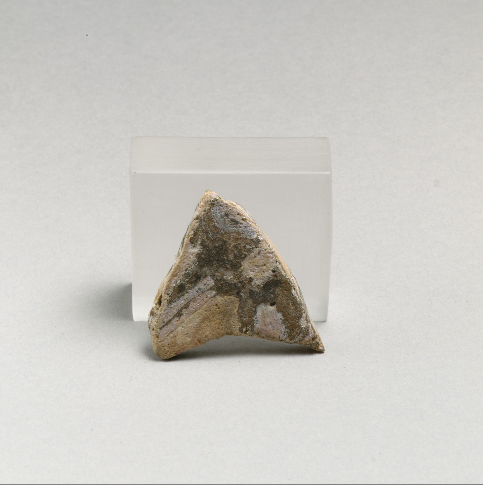 Triangular Pottery Shard Artifact
