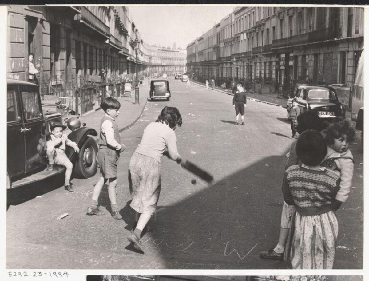 Children Playing Ball on Vintage Street