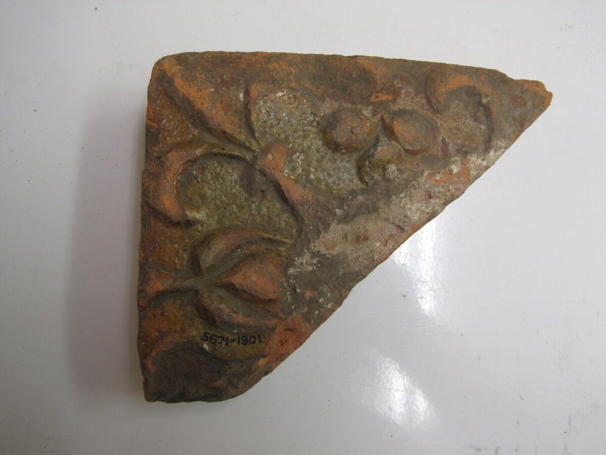 Triangular Carved Glazed Pottery Fragment