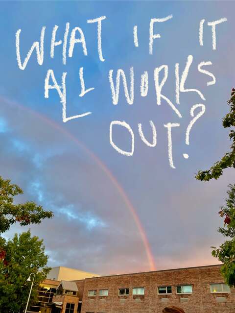 Motivational Quote Over Rainbow Sky