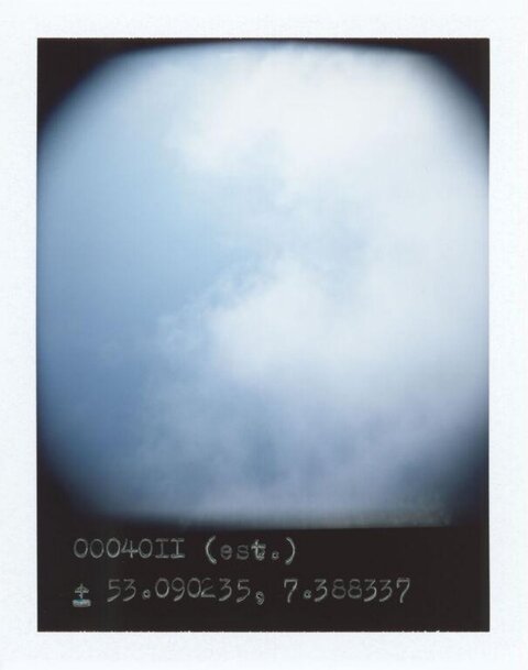 Blurry Cloudy Sky with Coordinates