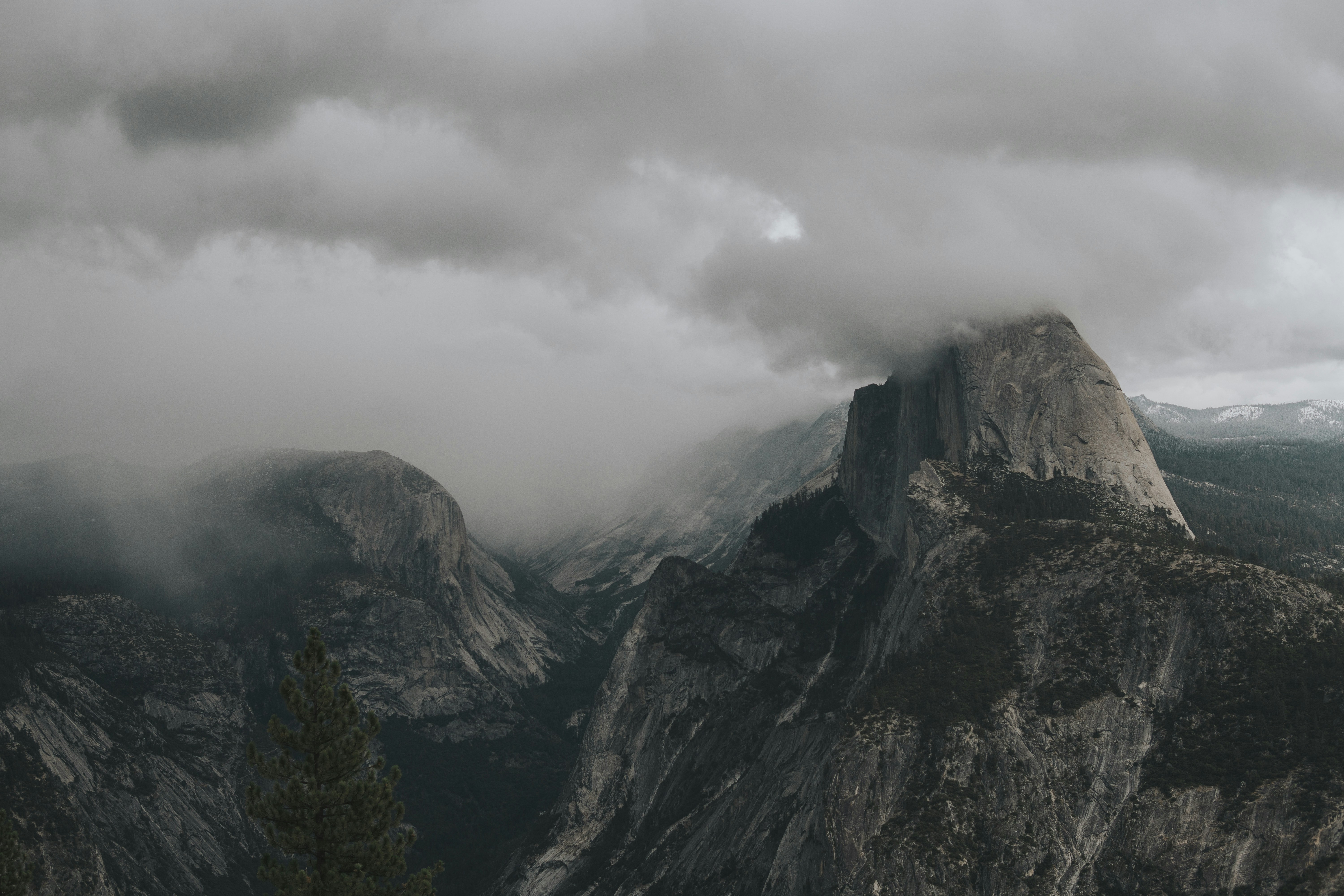 Cloud-covered Half Dome Mountain Valley
