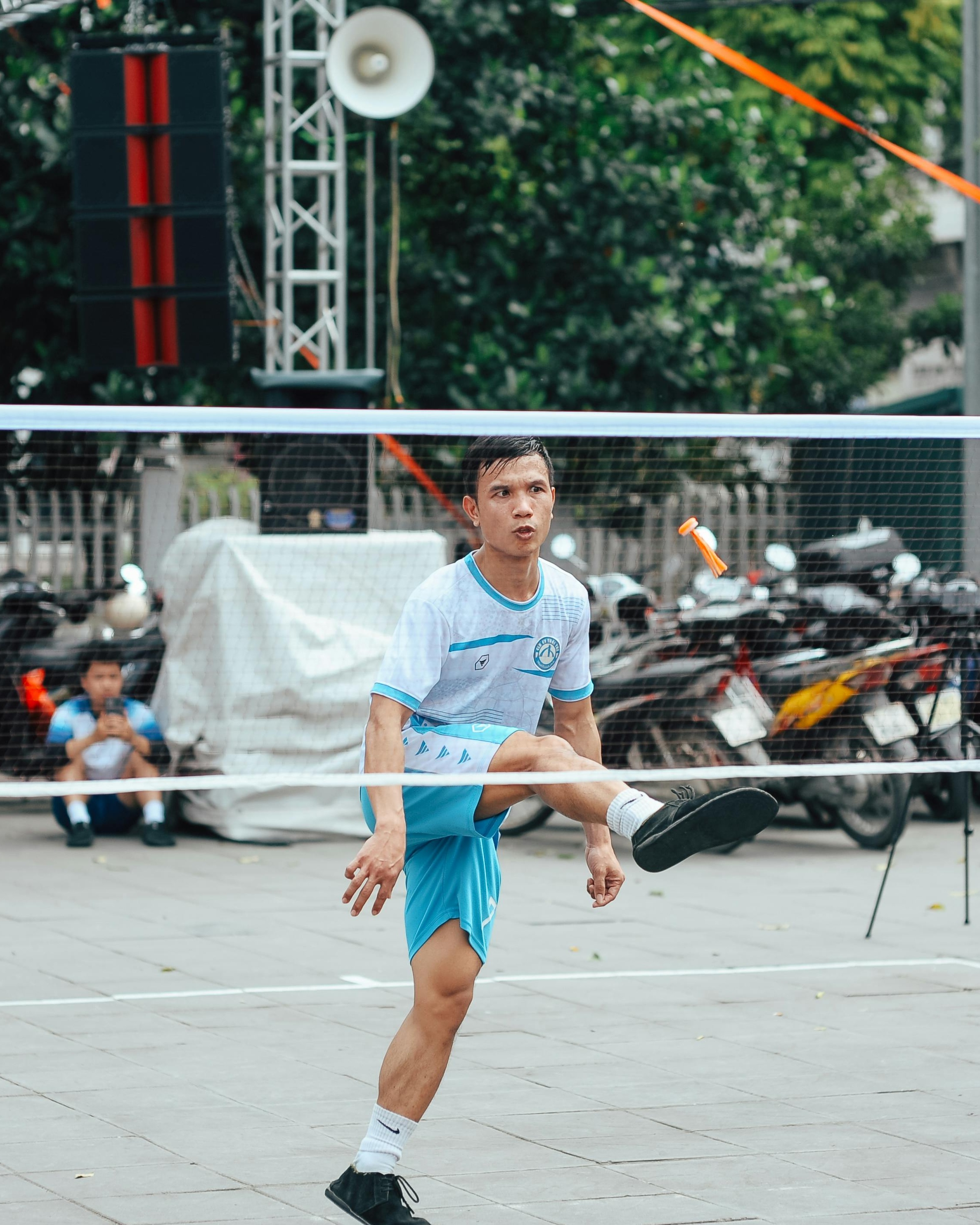 Man Playing Sepak Takraw Outdoors