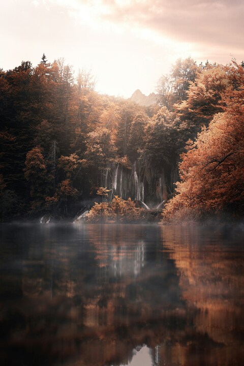 Autumn Waterfall by Calm Lake