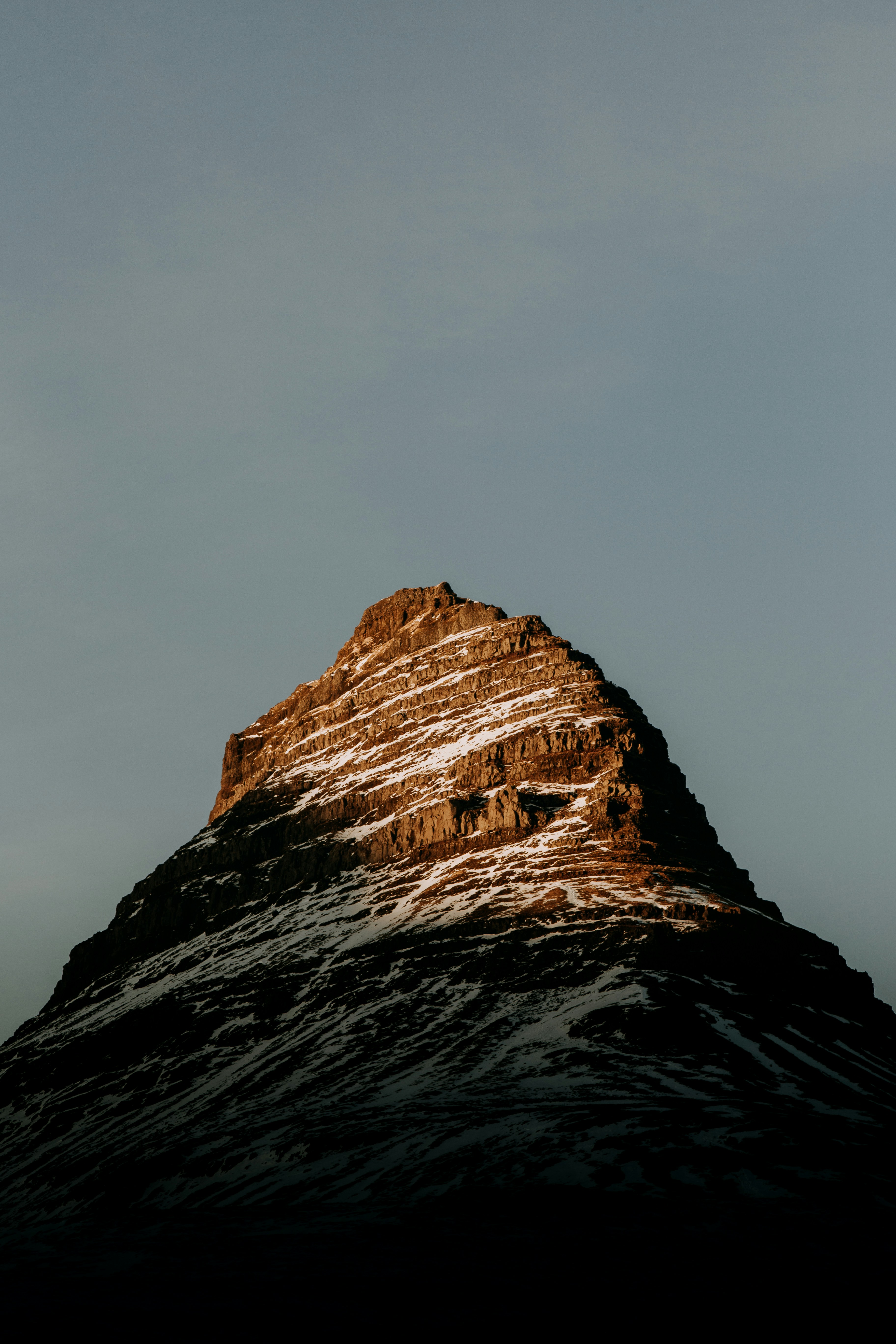 Sunlit Snow-Capped Mountain Peak