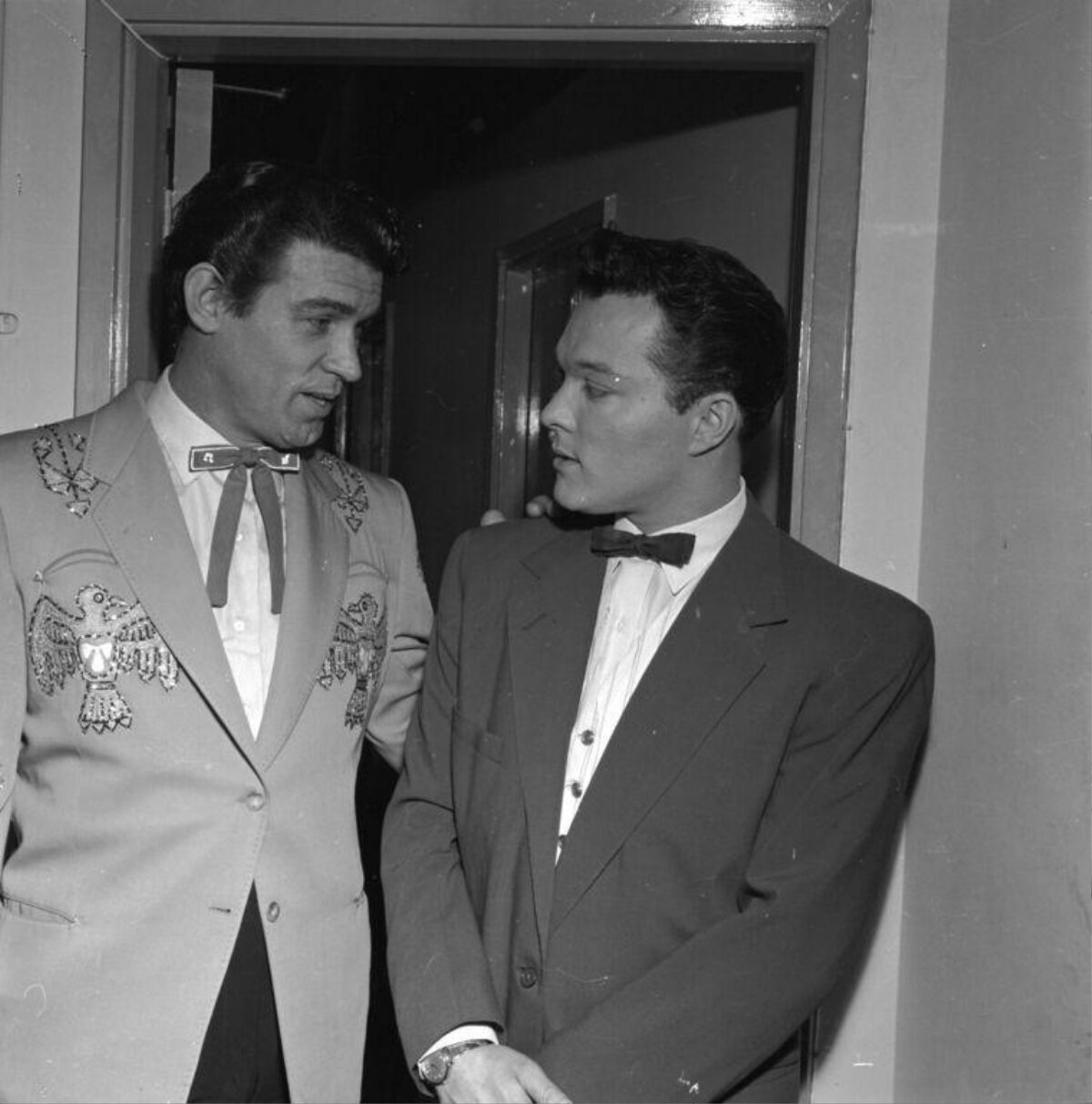 Two Musicians Talking Backstage