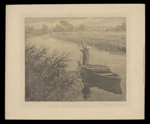 Man with Boat on Calm River