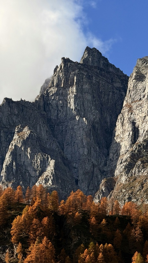 Steep Rocky Mountains in Autumn