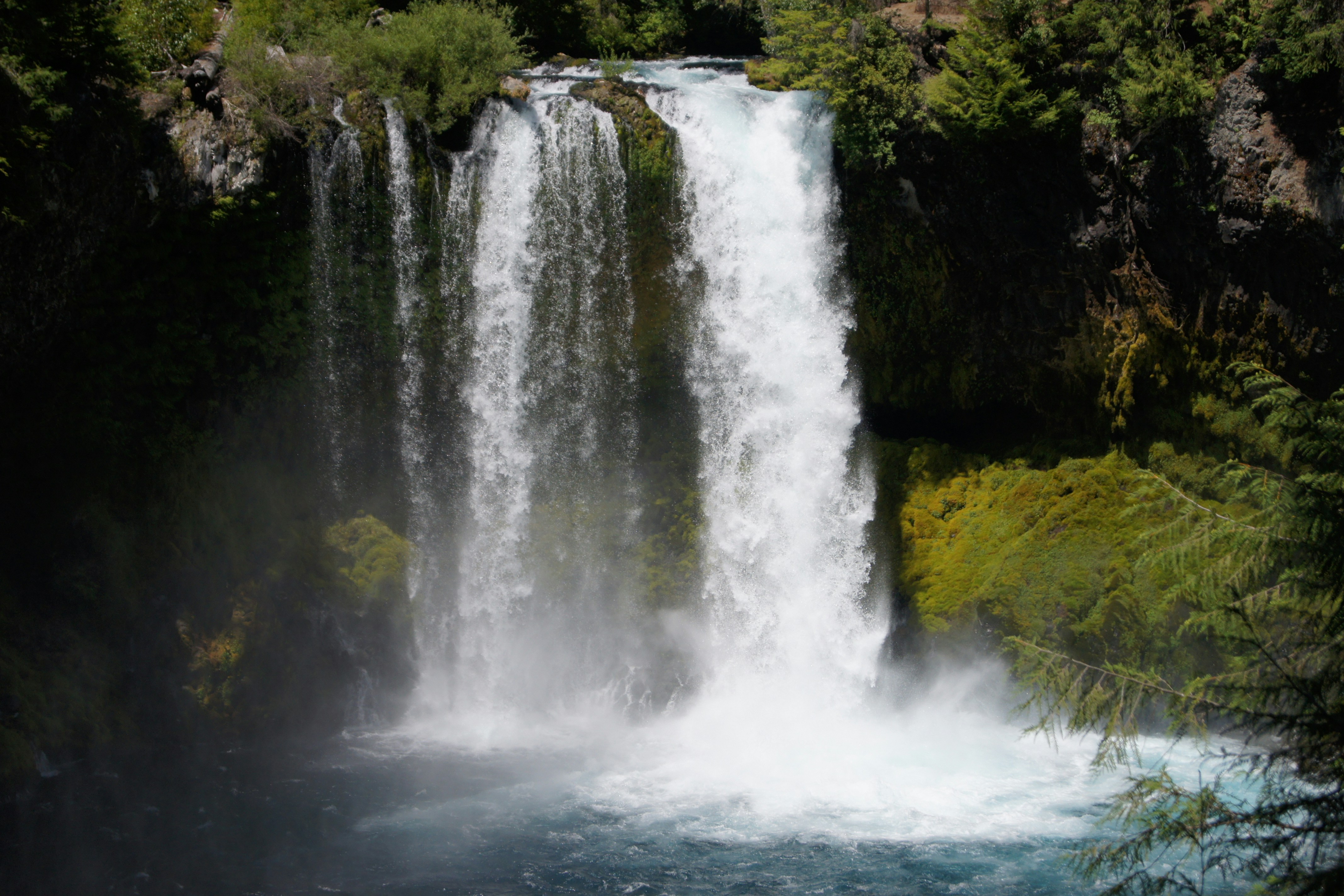 Lush Green Mountain Waterfall