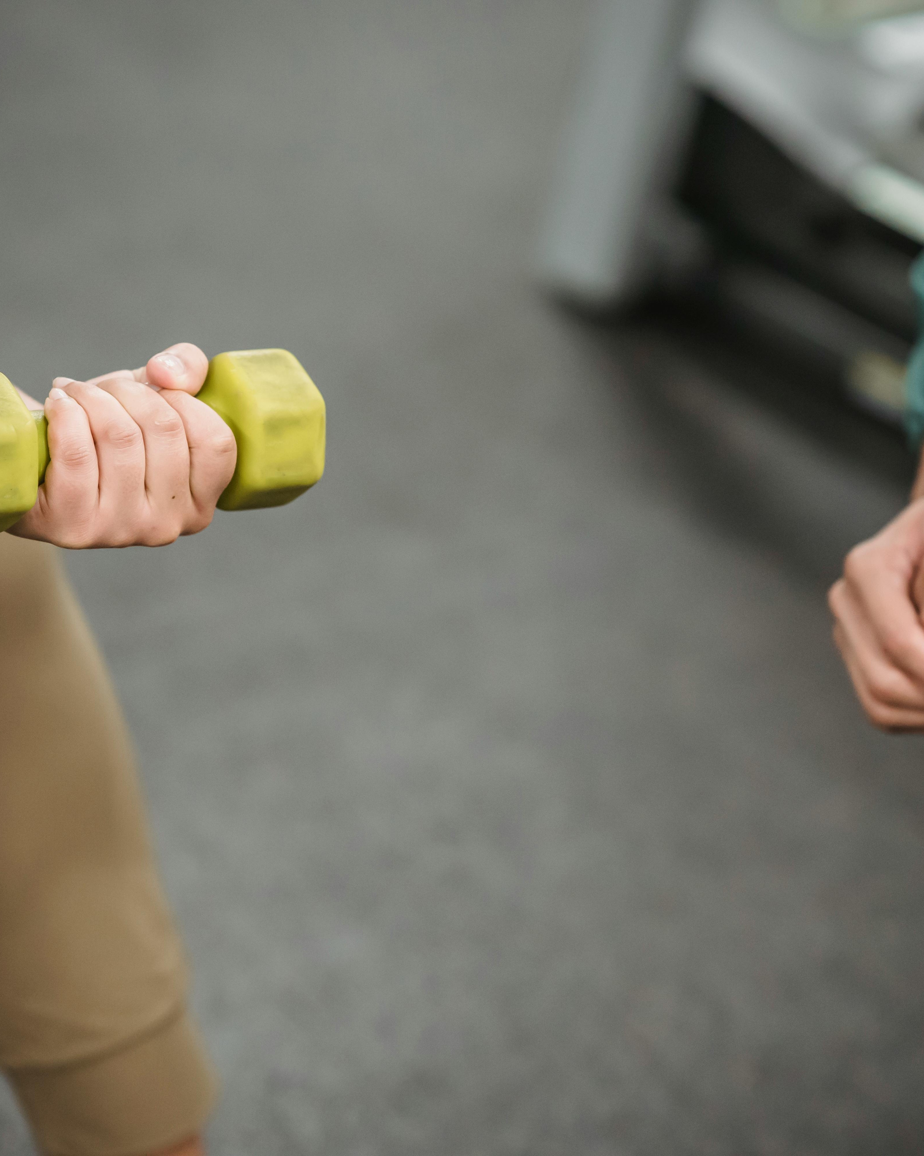 Hand Doing Dumbbell Bicep Curl