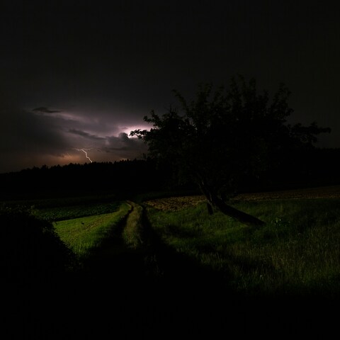 Night Thunderstorm Over Countryside