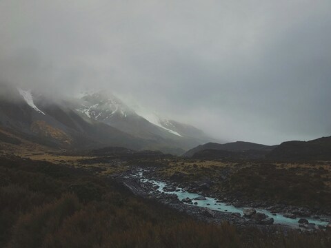 Misty Mountain Valley with Glacial River