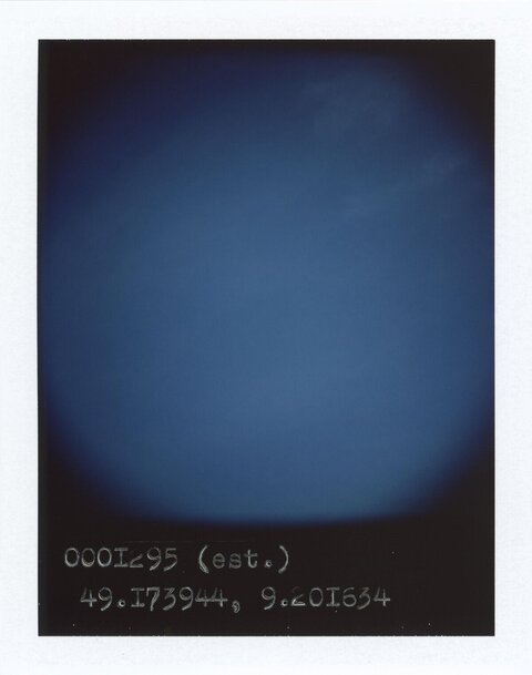 Polaroid With Handwritten Coordinates