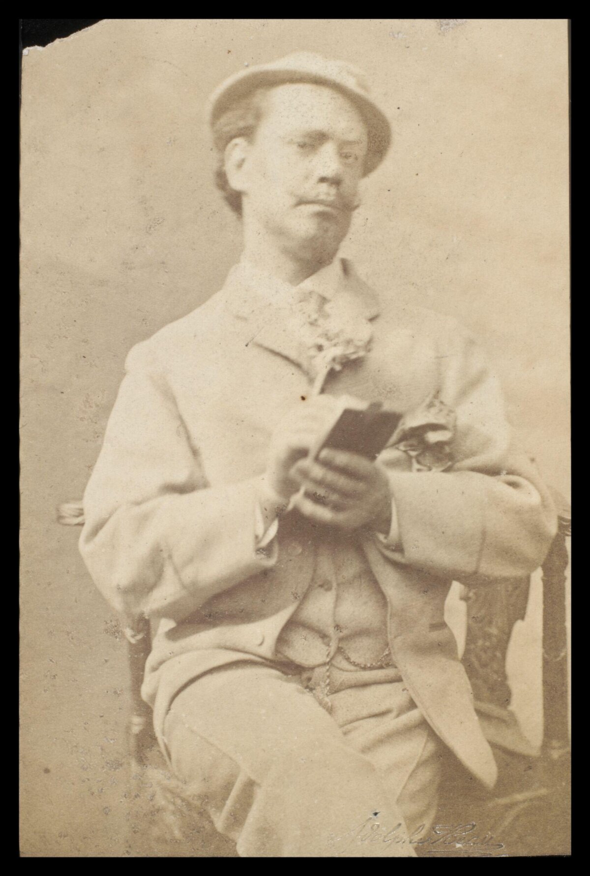 Vintage Portrait of Seated Man with Book