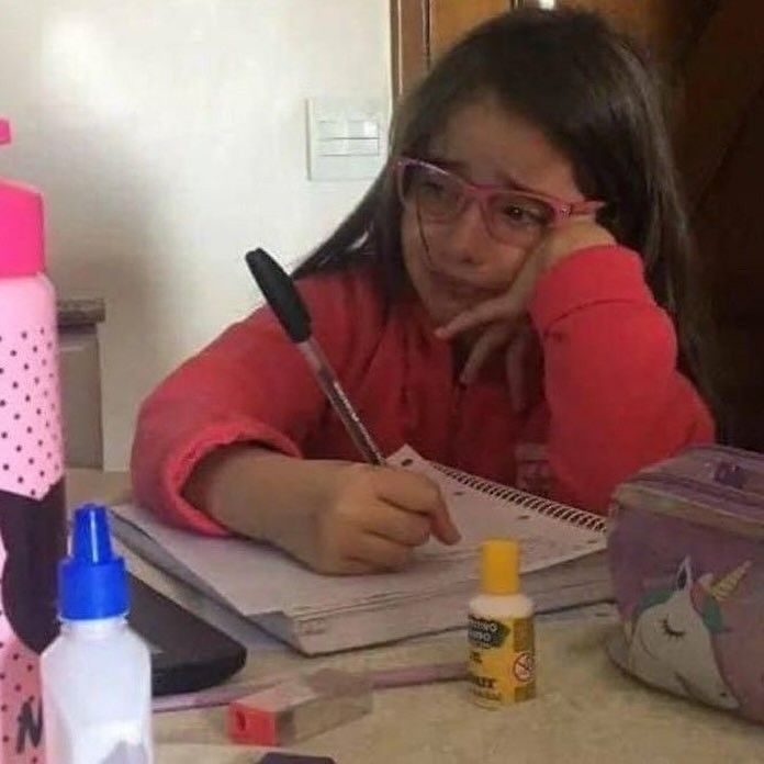 Bored Girl Doing Homework