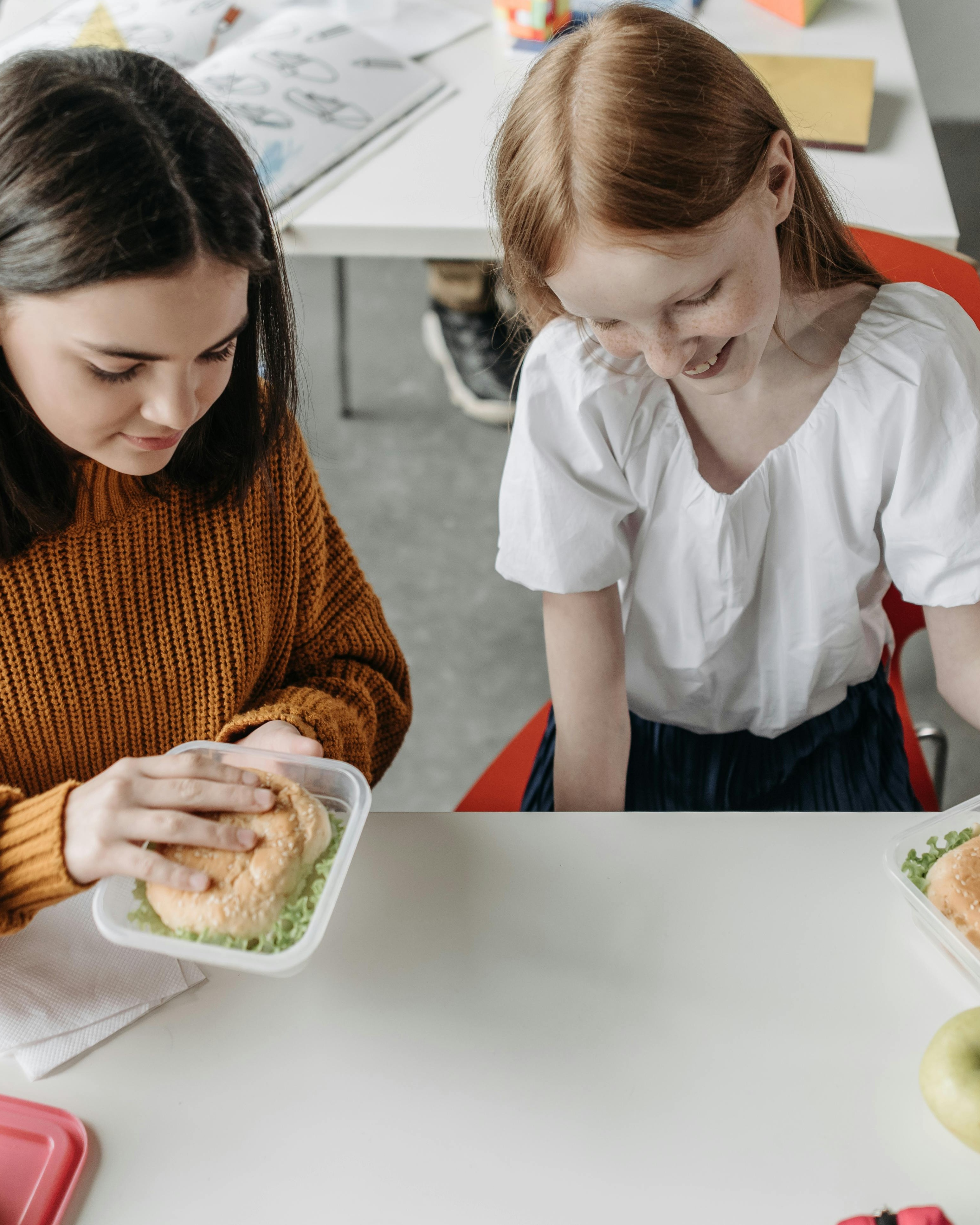 Two Girls Having Lunch Break