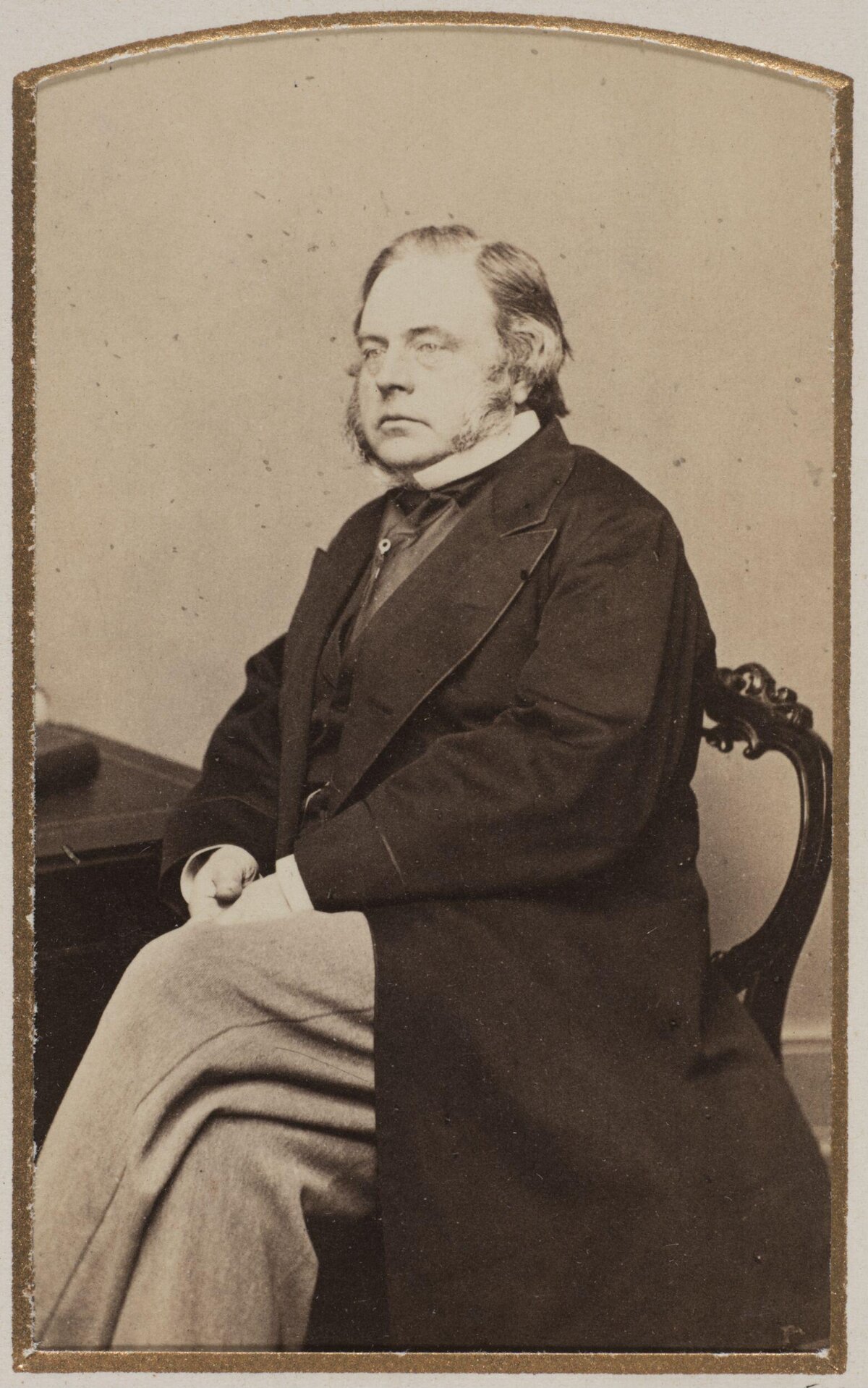 Vintage Portrait of Seated Victorian Man