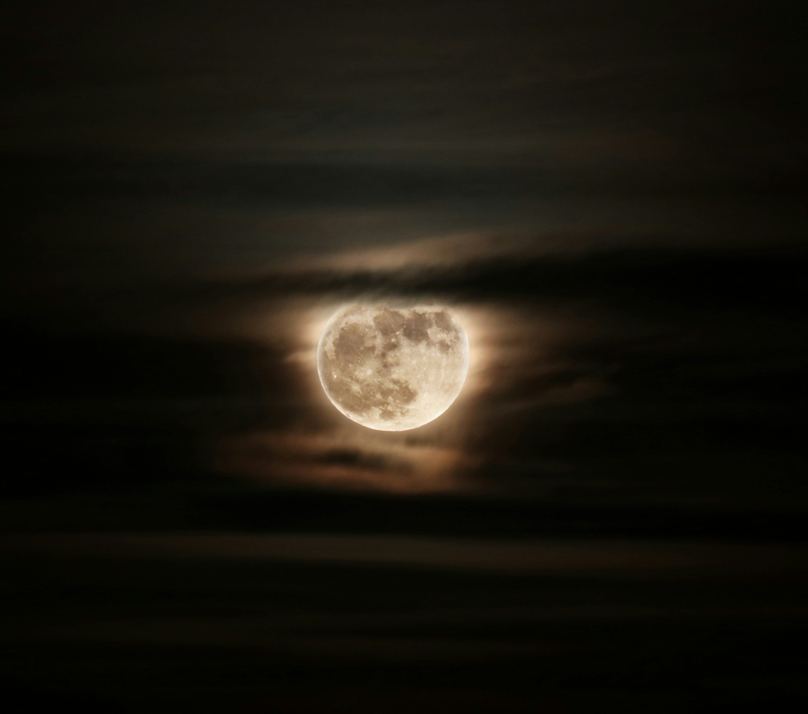 Full Moon Through Night Clouds