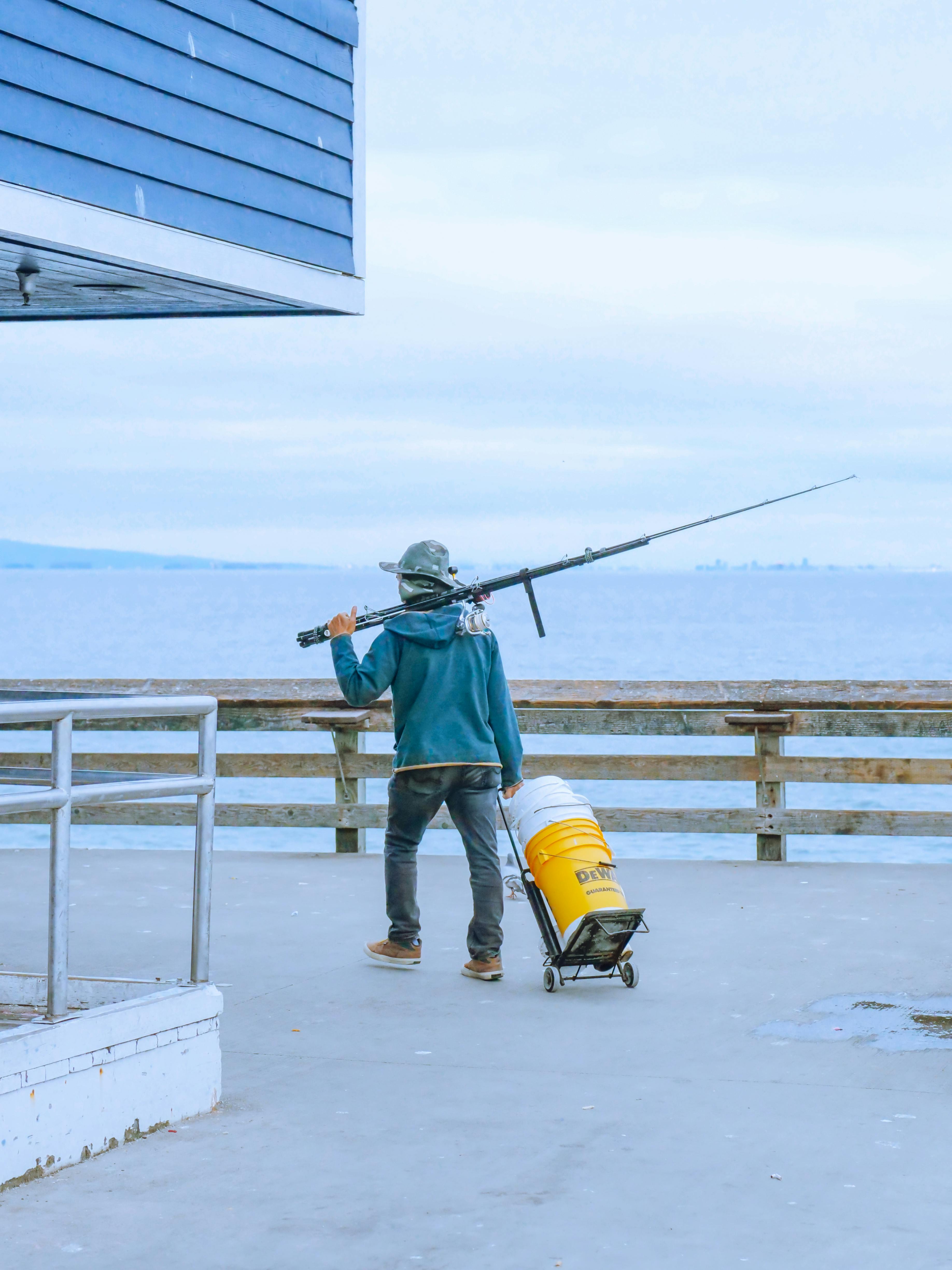 Fisherman on Ocean Fishing Pier