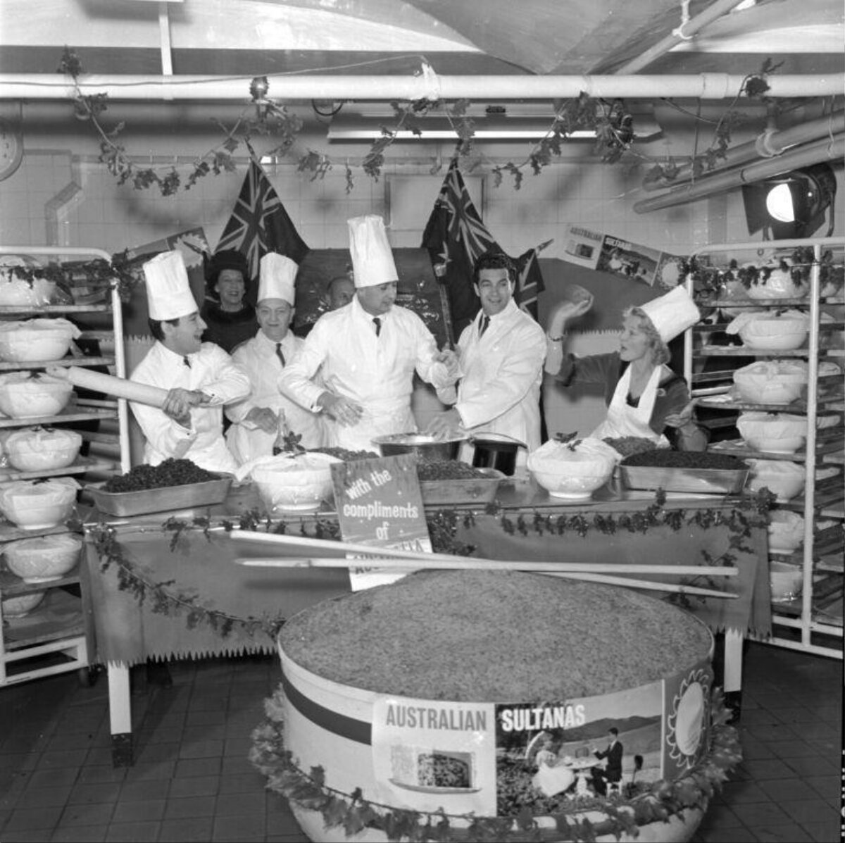 Chefs Preparing Giant Pudding