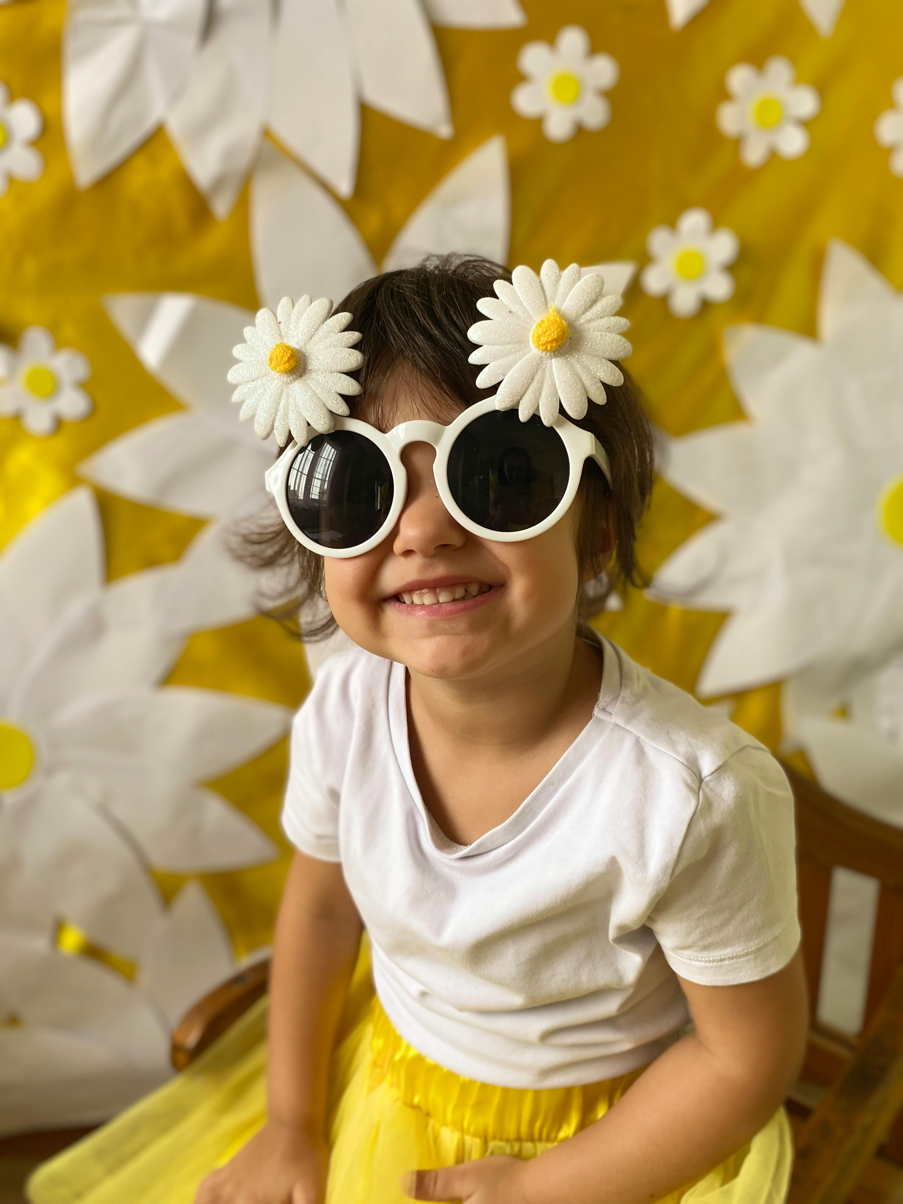 Smiling Girl With Daisy Sunglasses