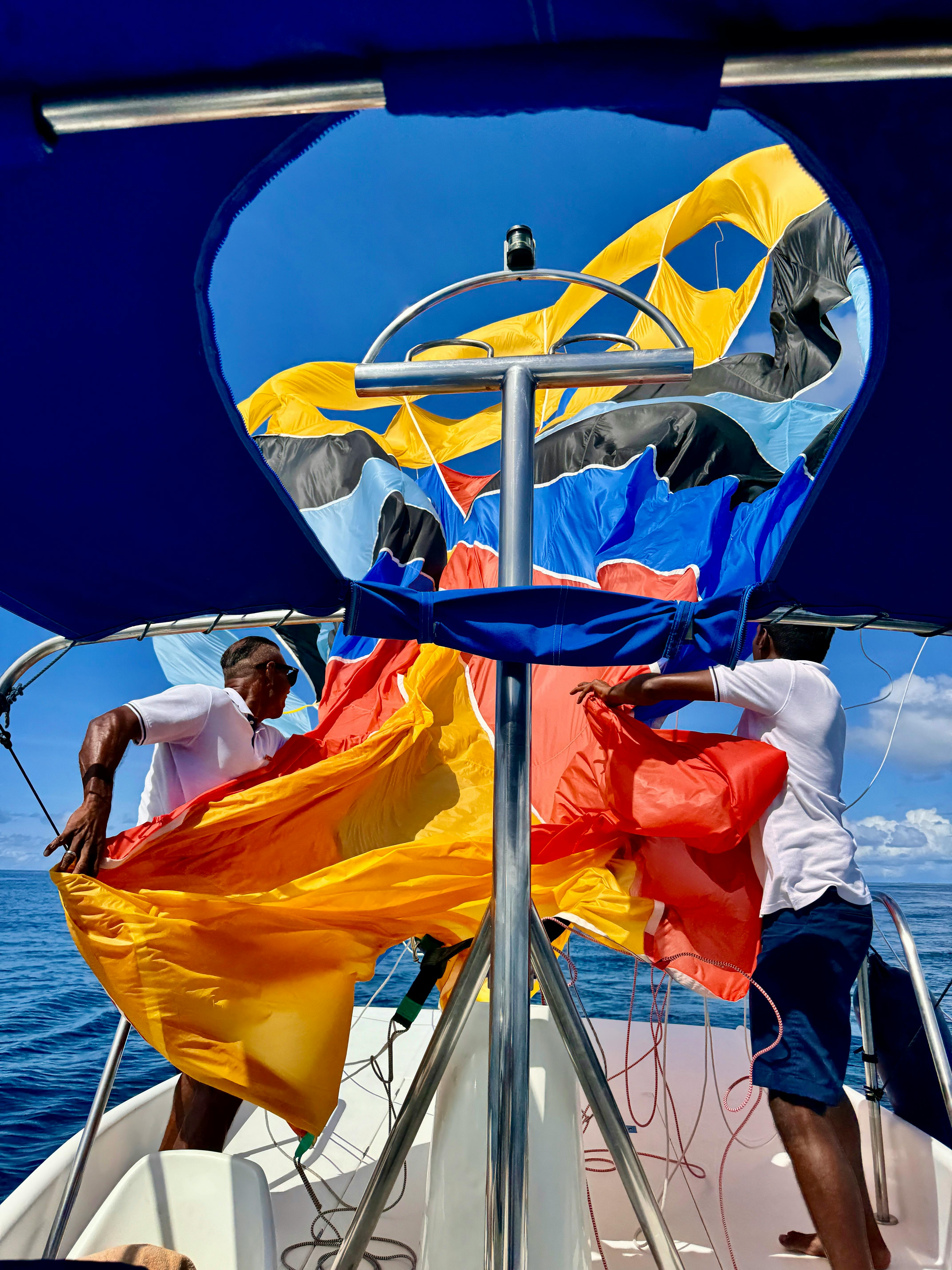 Two Men Preparing Parasailing at Sea