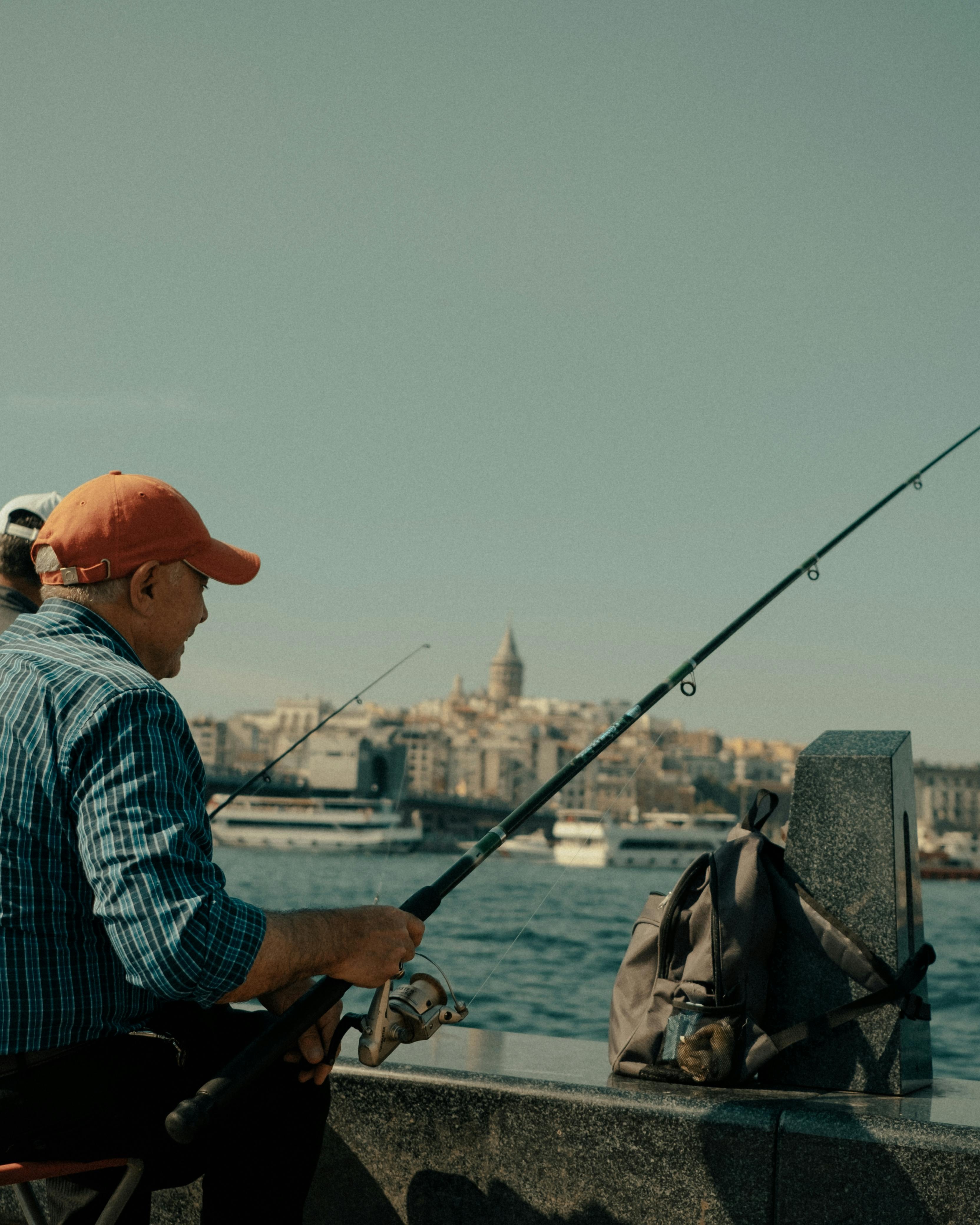 Man Fishing at Istanbul Waterfront