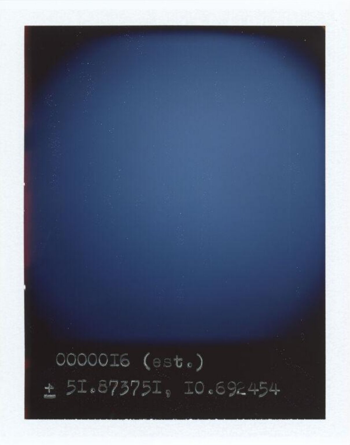 Polaroid with Handwritten Coordinates
