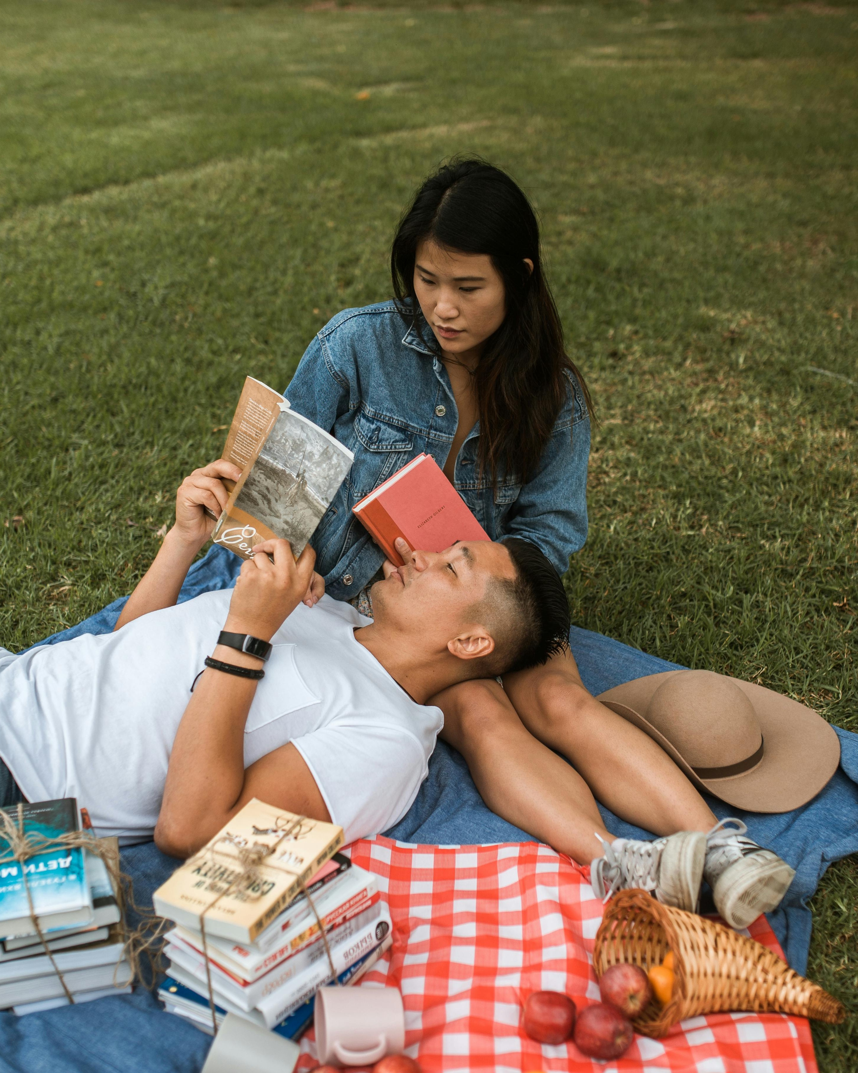 Couple Reading on Park Picnic