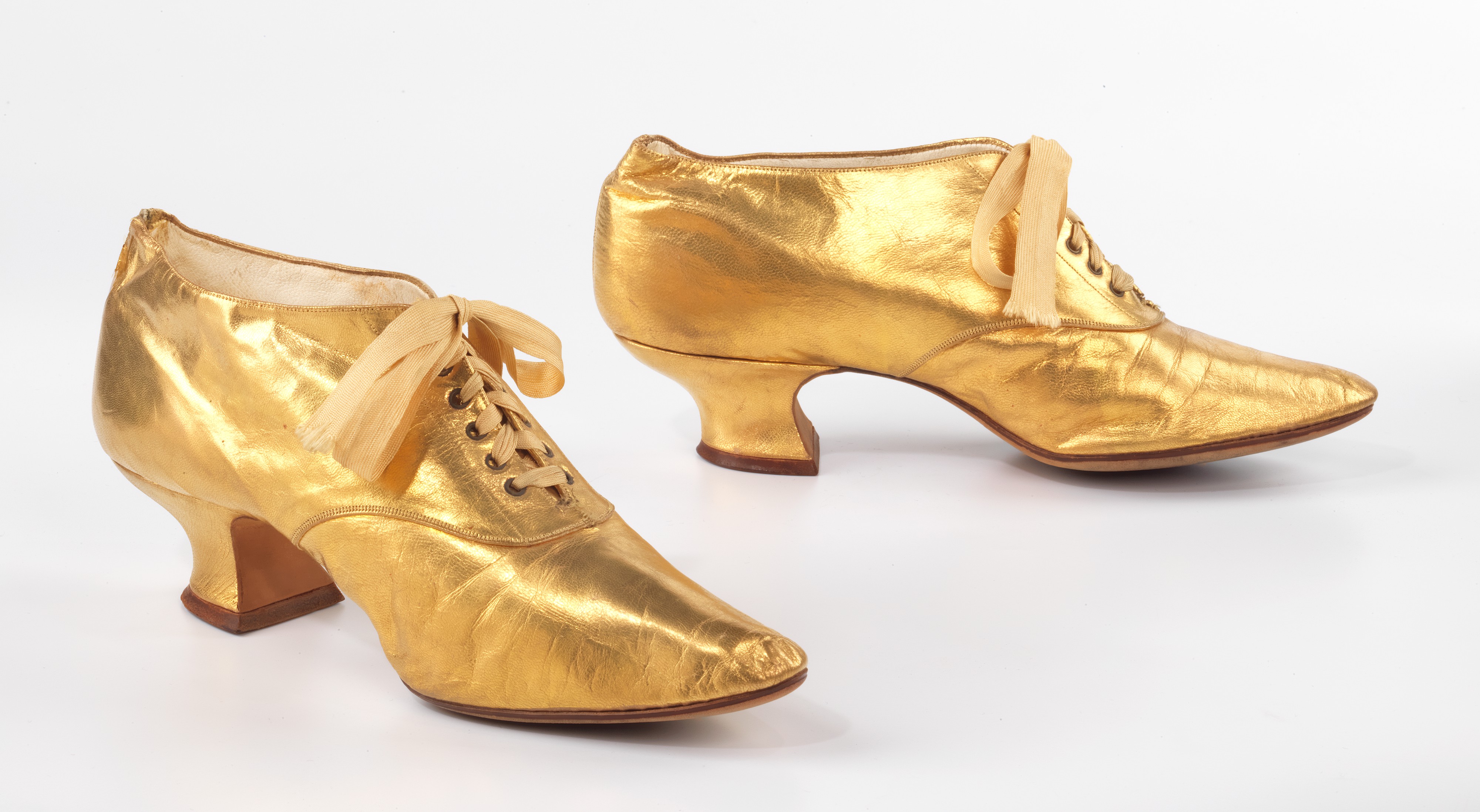 Pair of Golden Vintage Lace-up Heels